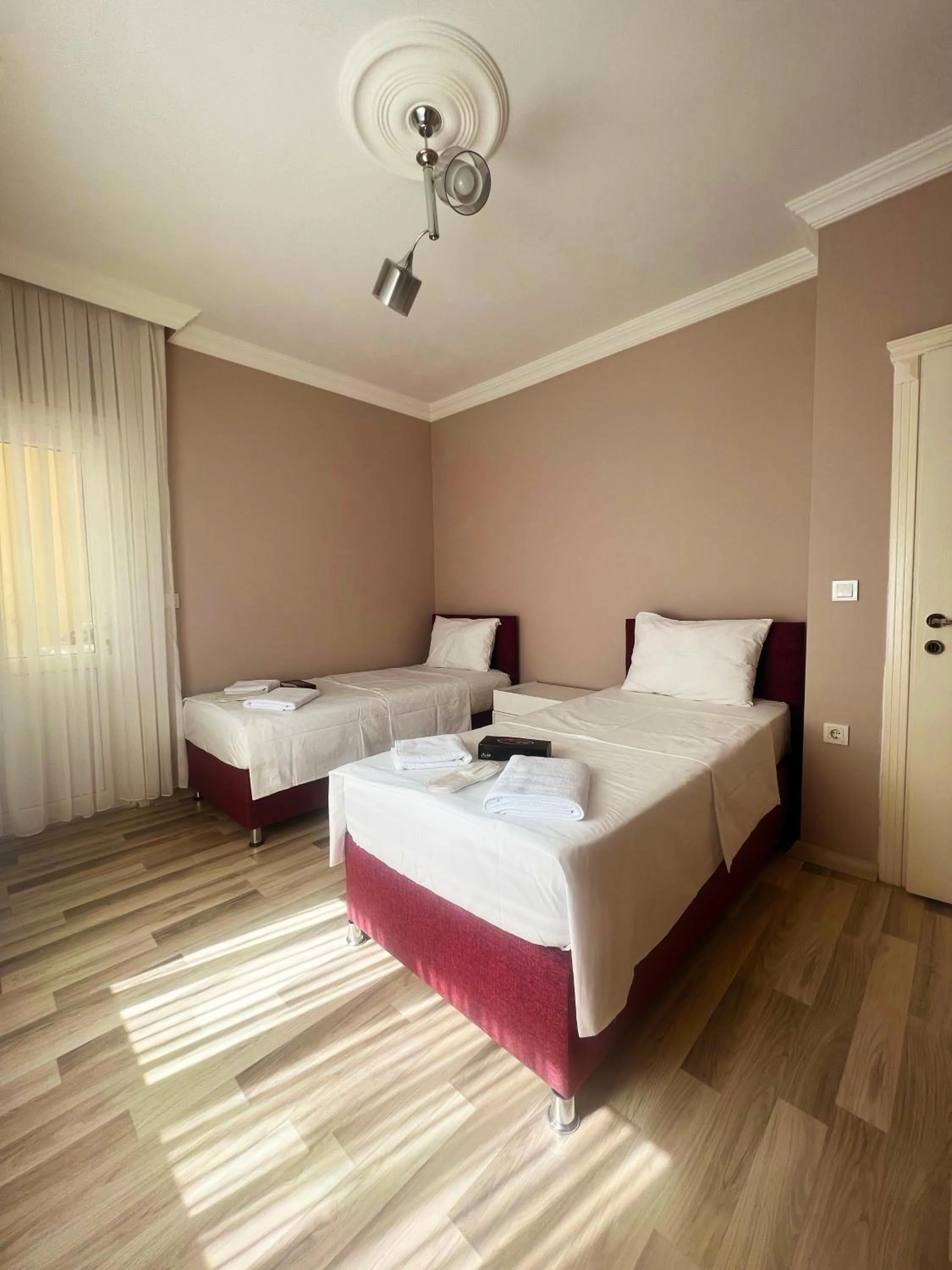 Bed in Seabird Suite Apart Hotel