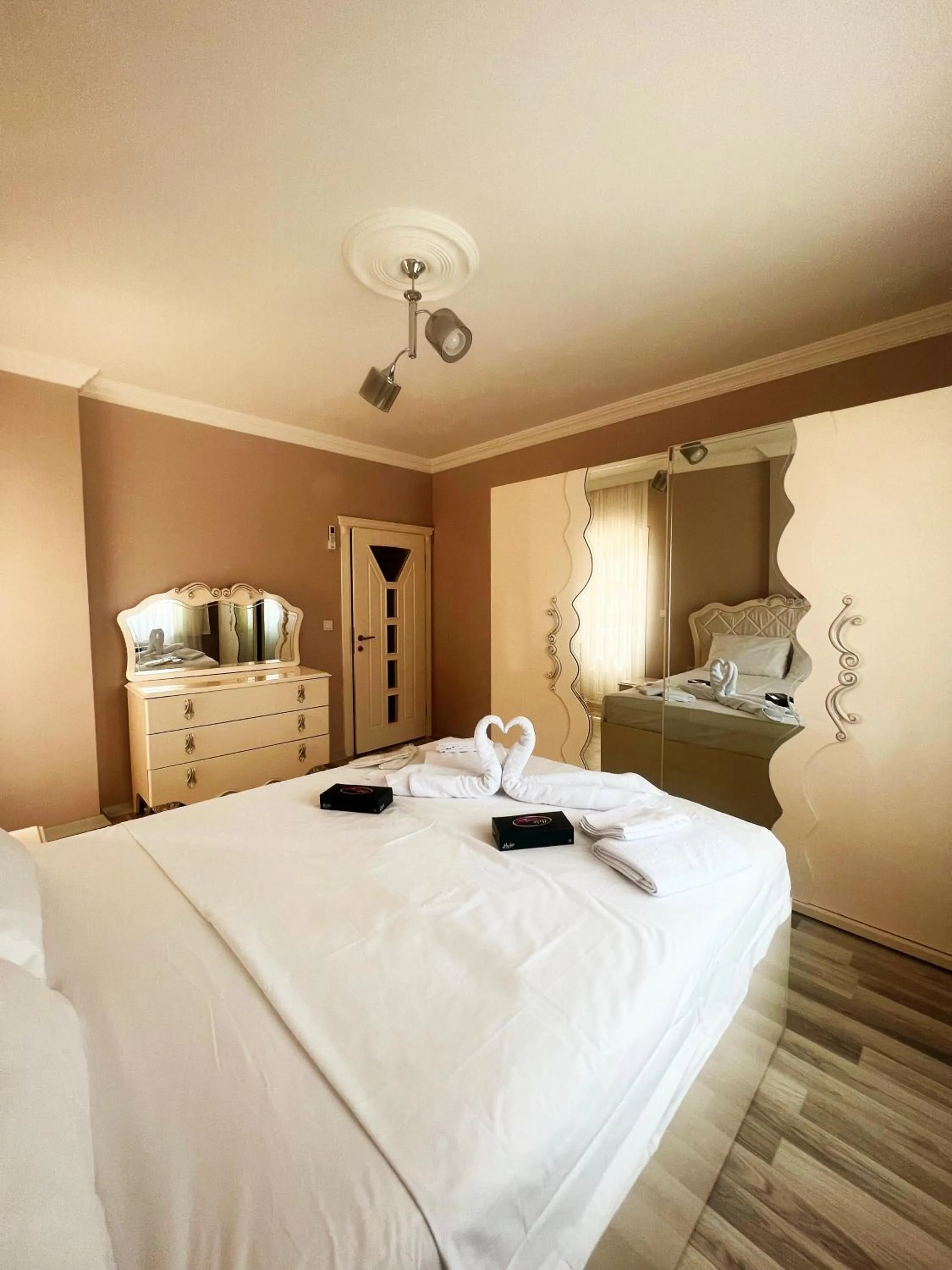 Bed in Seabird Suite Apart Hotel