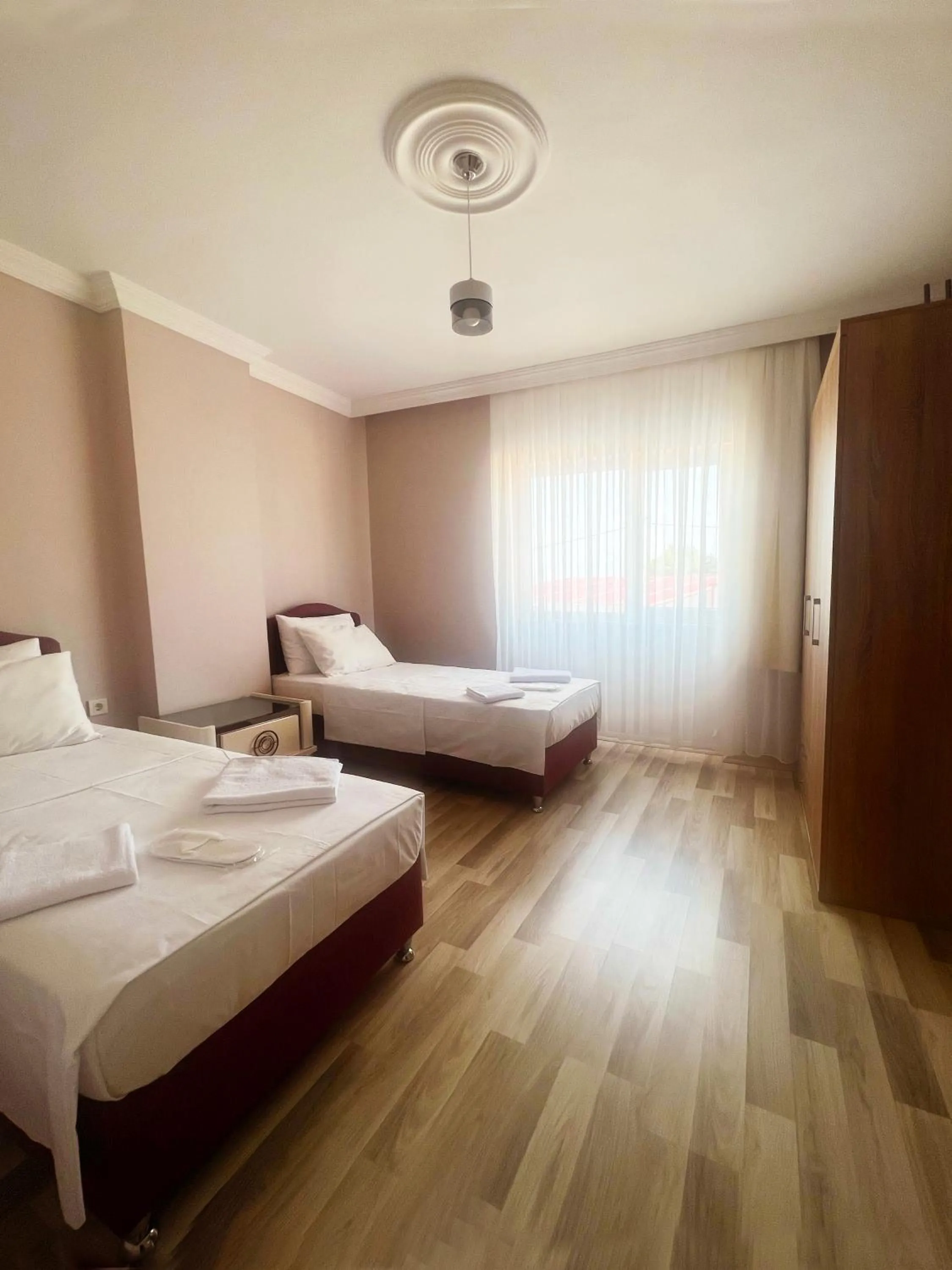 Bed in Seabird Suite Apart Hotel