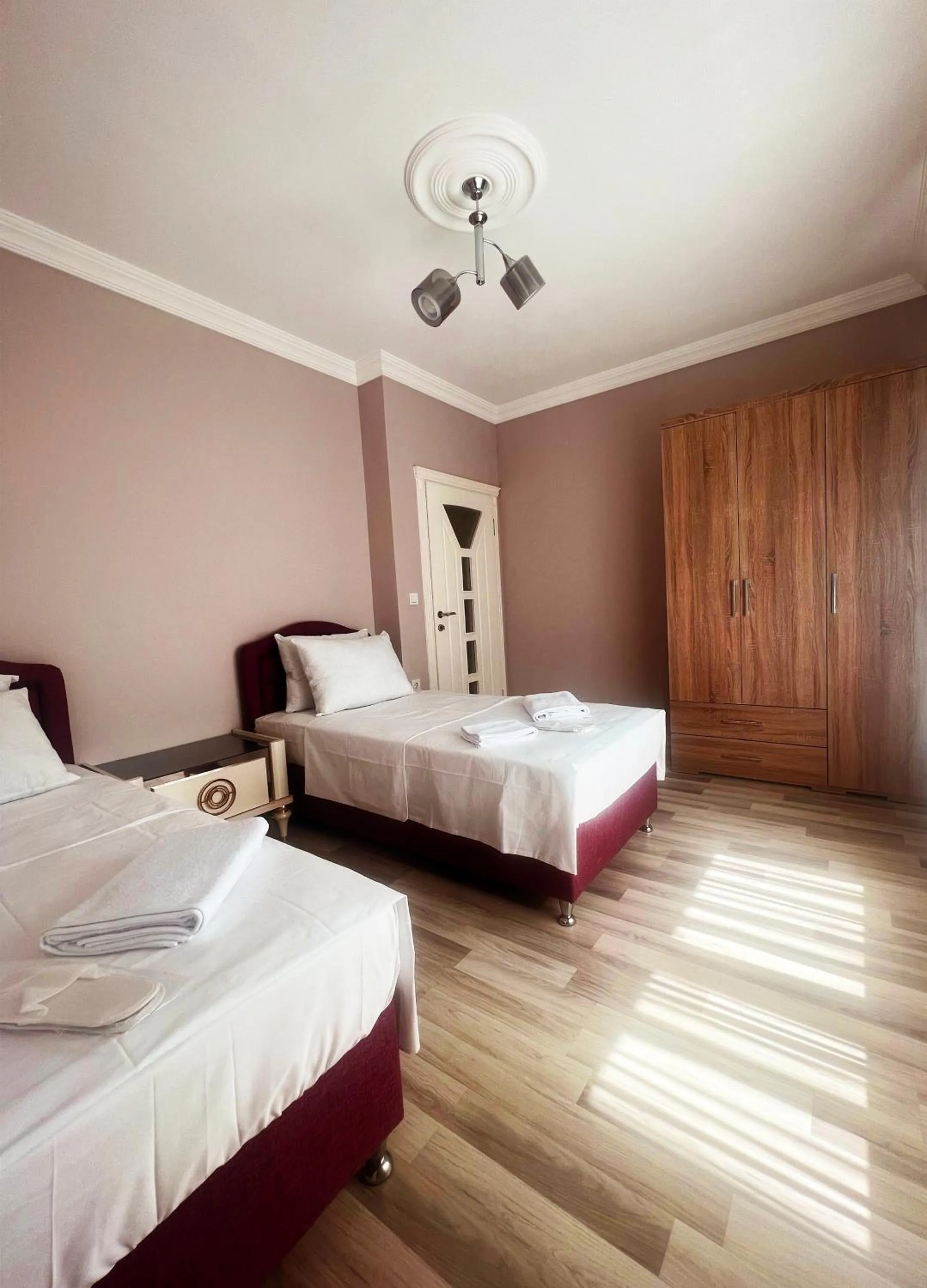 Bed in Seabird Suite Apart Hotel