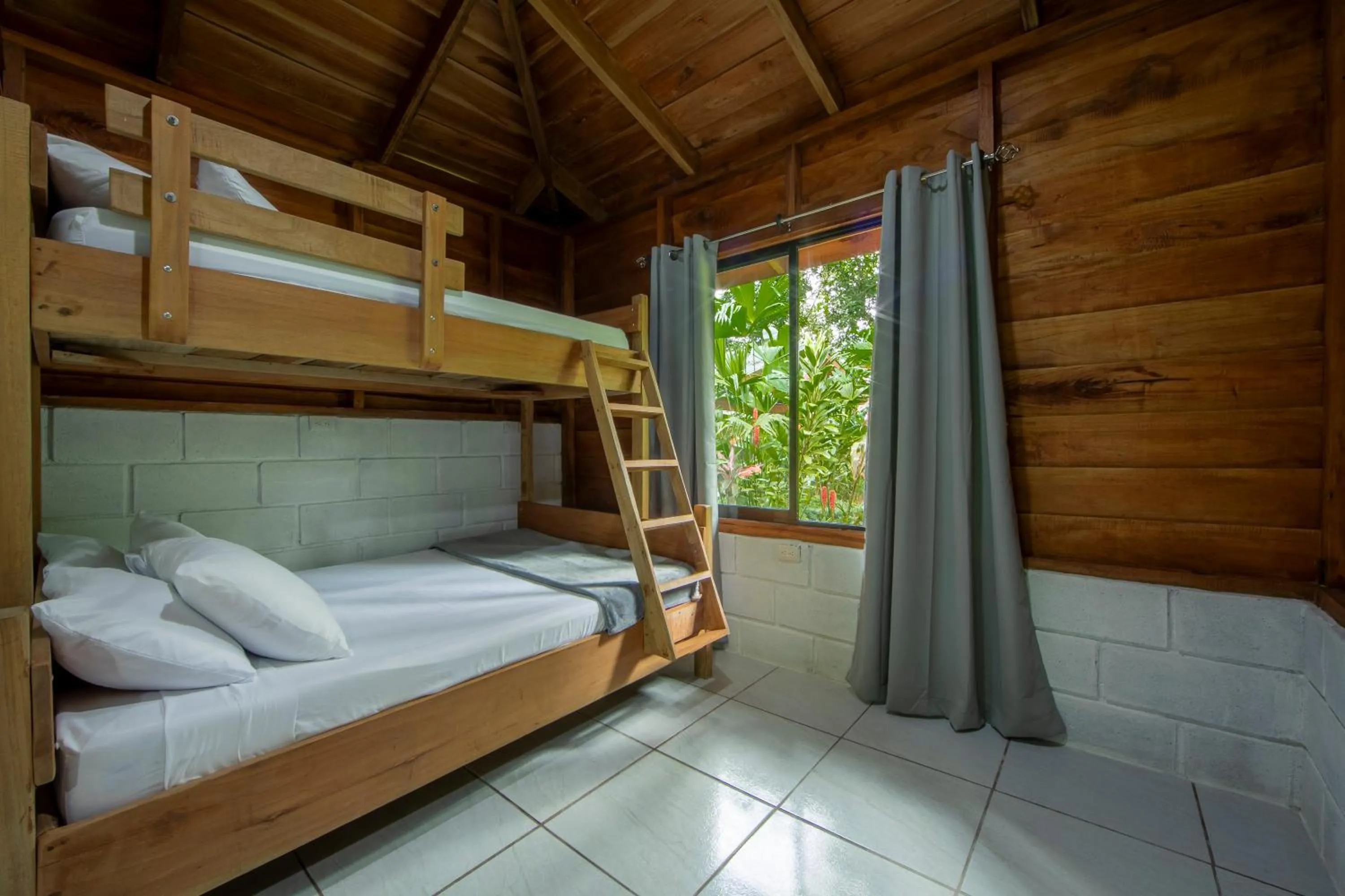 Bed in Eden Organic Farm & Bungalows