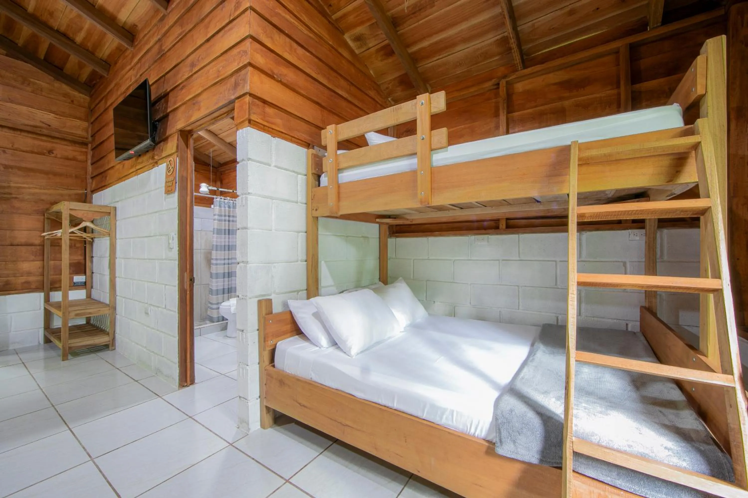 Bed in Eden Organic Farm & Bungalows