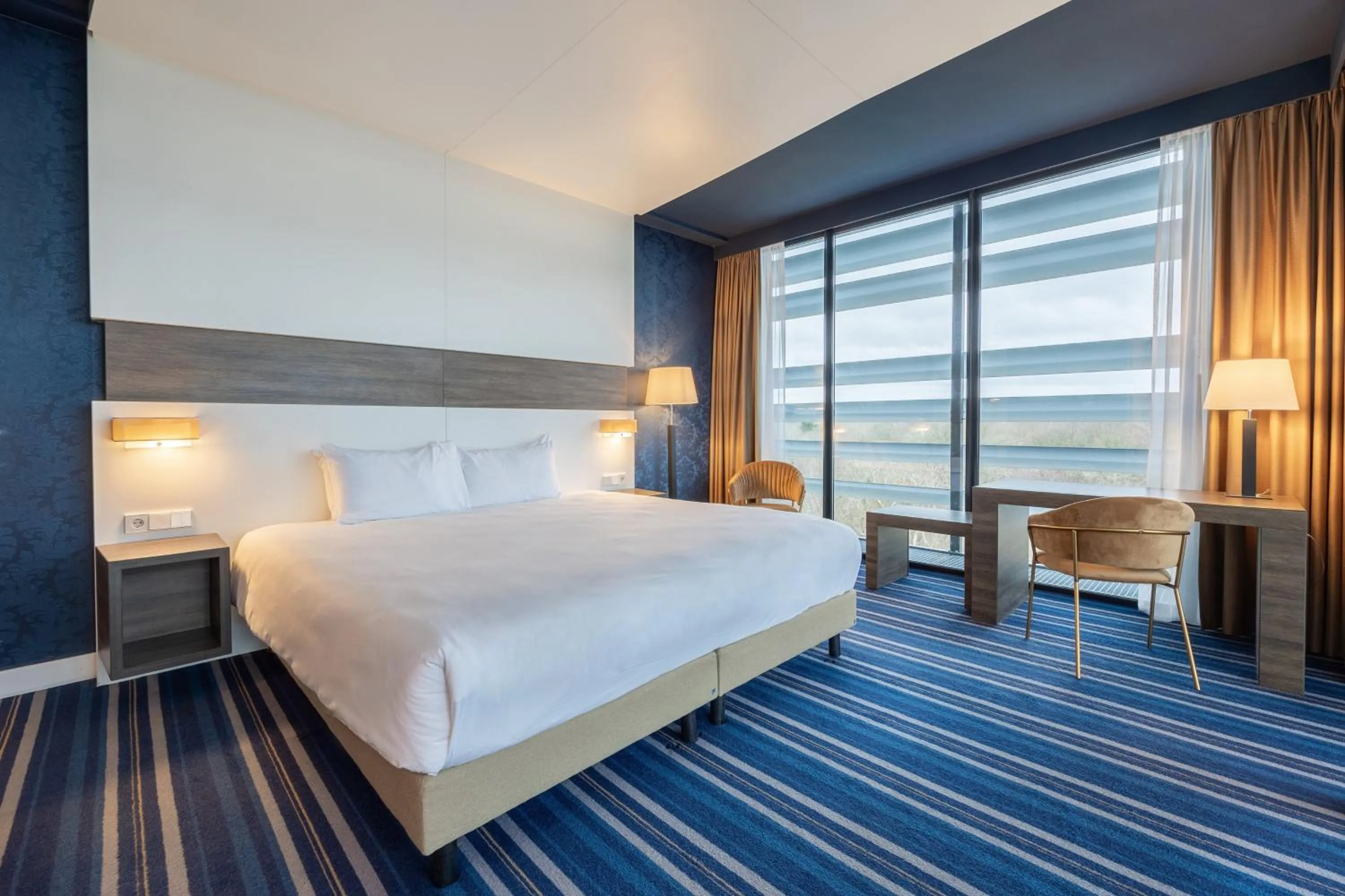 Photo of the whole room, Bed in Leonardo Royal Hotel Den Haag Promenade