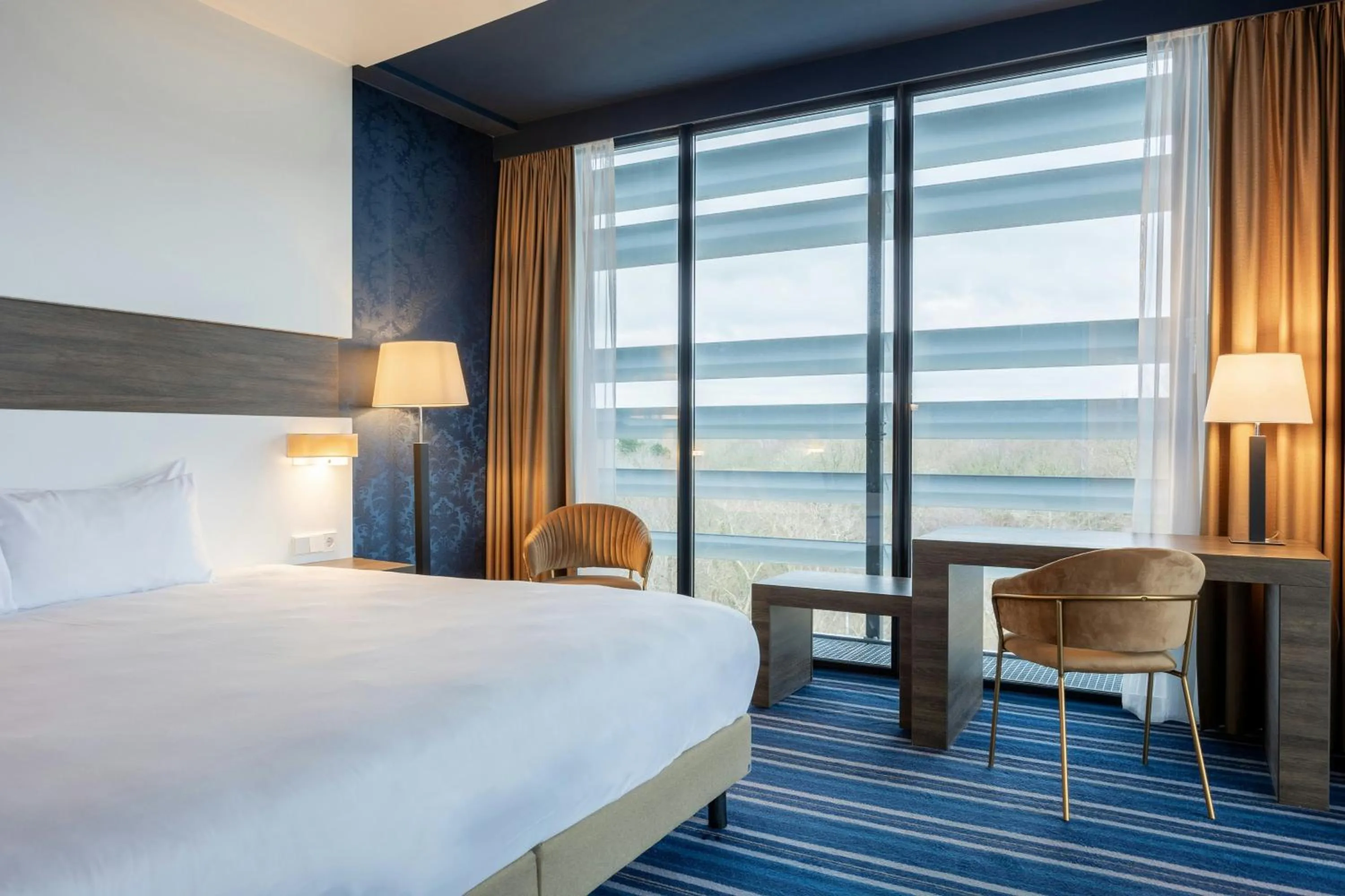 Photo of the whole room, Bed in Leonardo Royal Hotel Den Haag Promenade