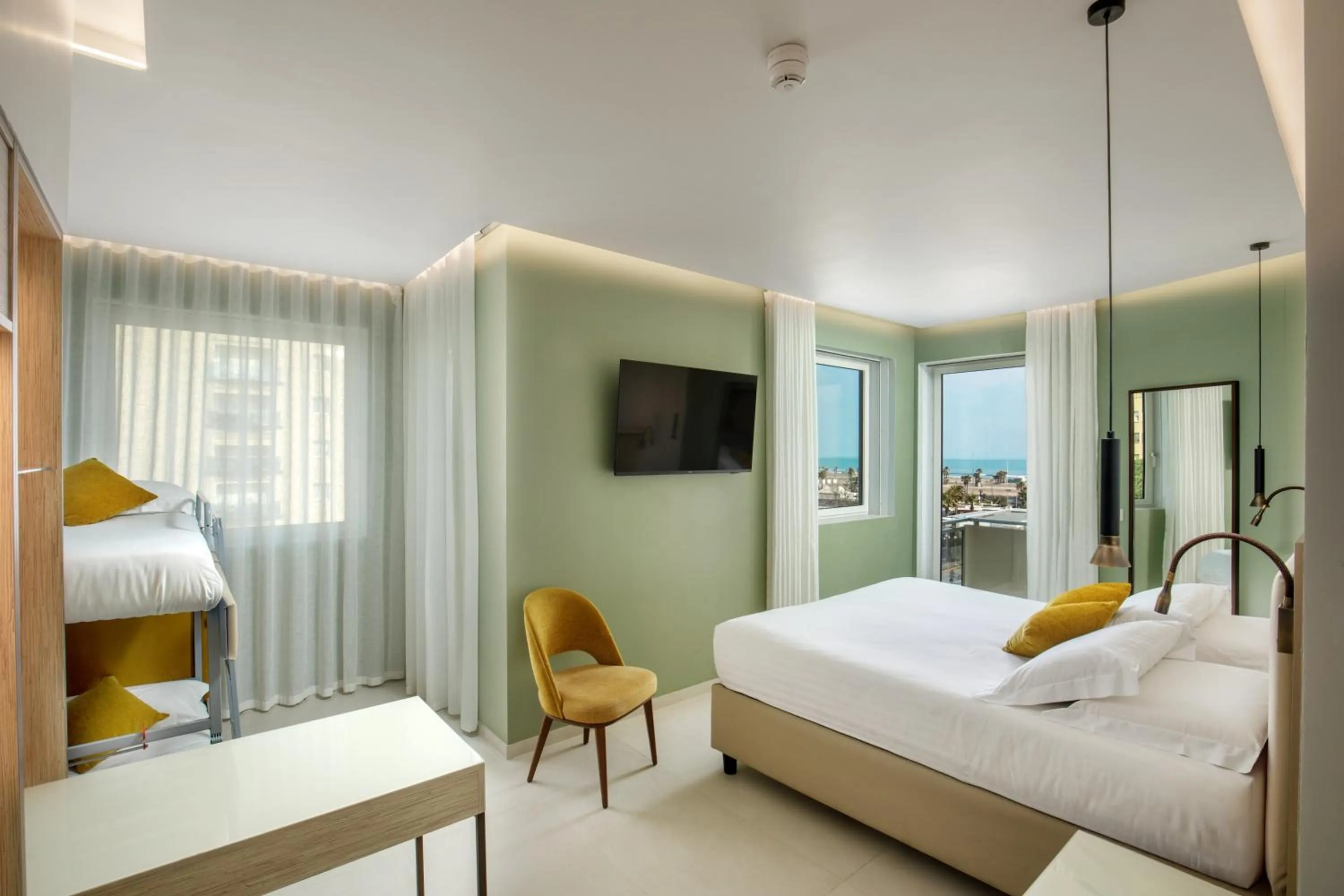 Bed in Ambasciatori Suite Hotel