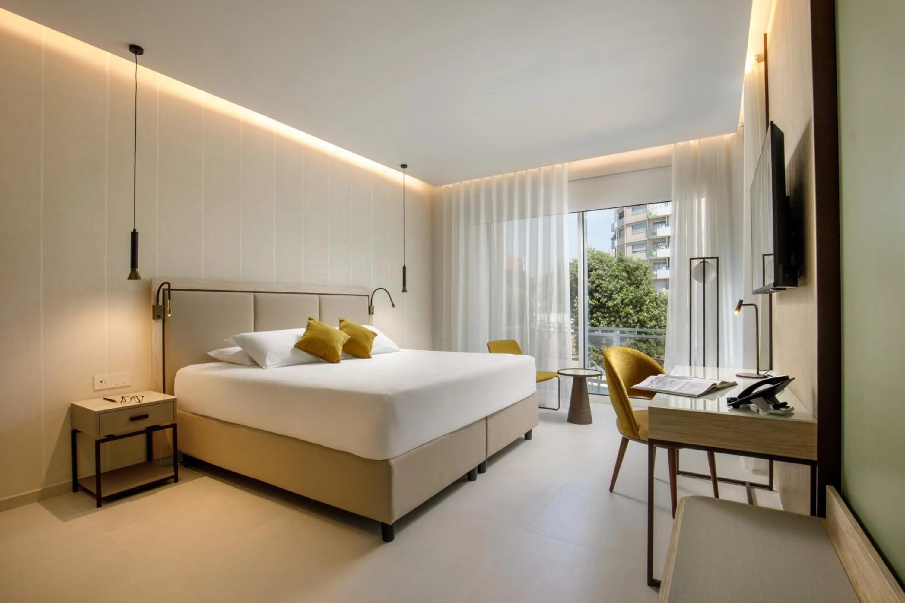 Bed in Ambasciatori Suite Hotel