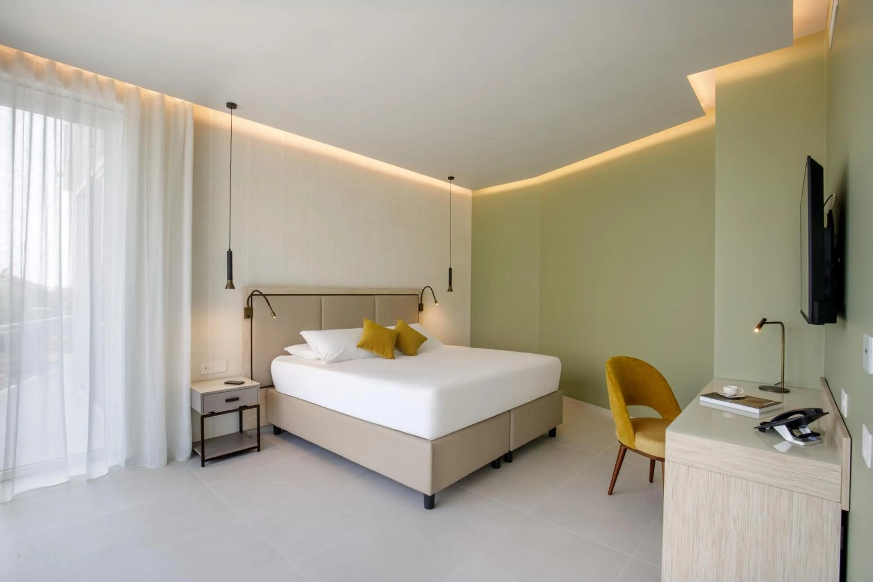 Bed in Ambasciatori Suite Hotel