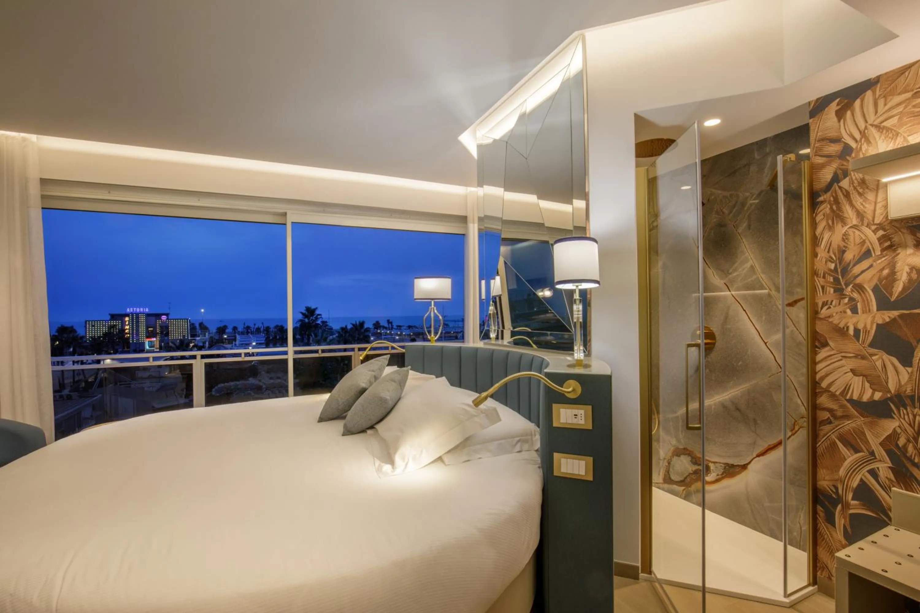 Bed in Ambasciatori Suite Hotel