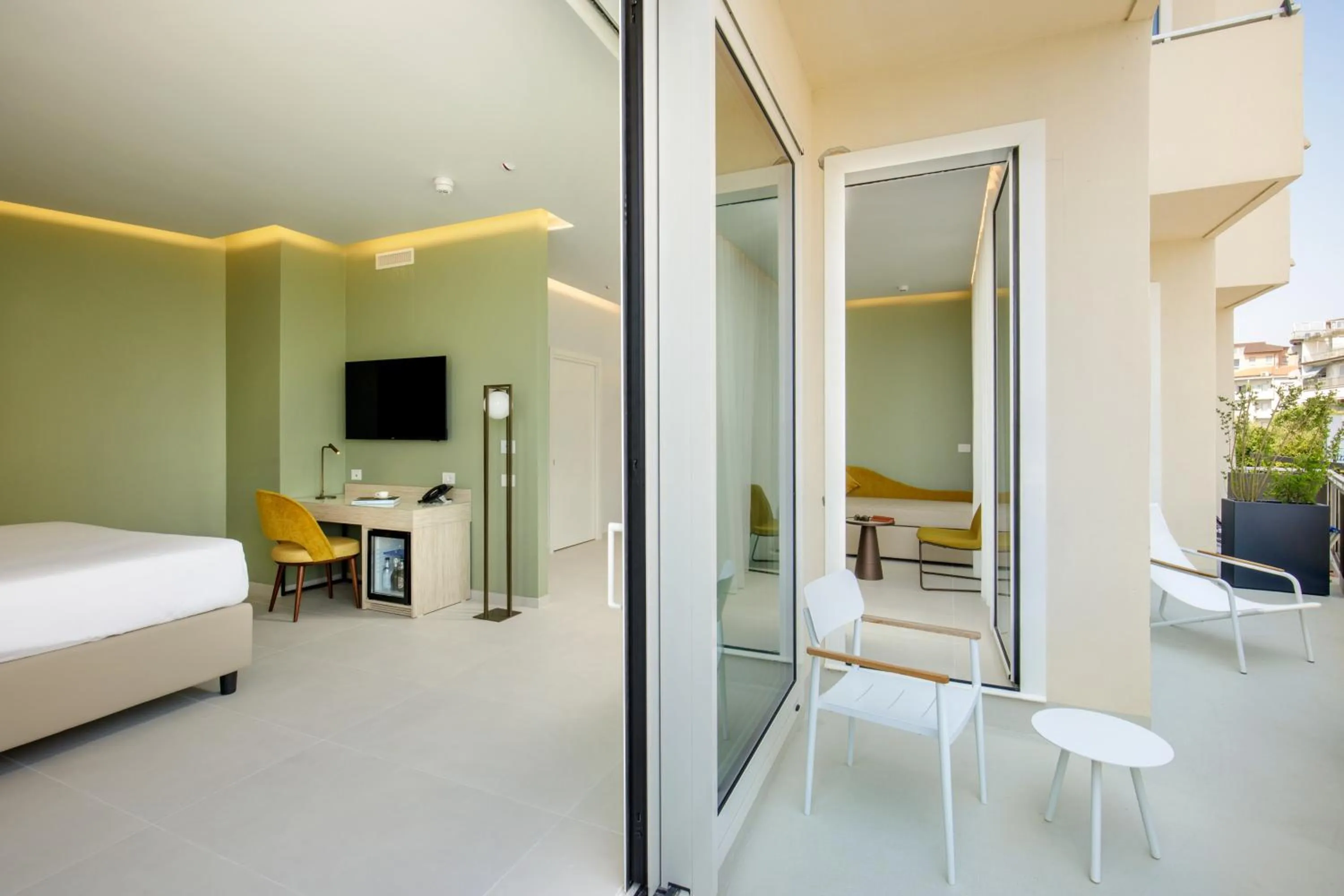 Bed in Ambasciatori Suite Hotel