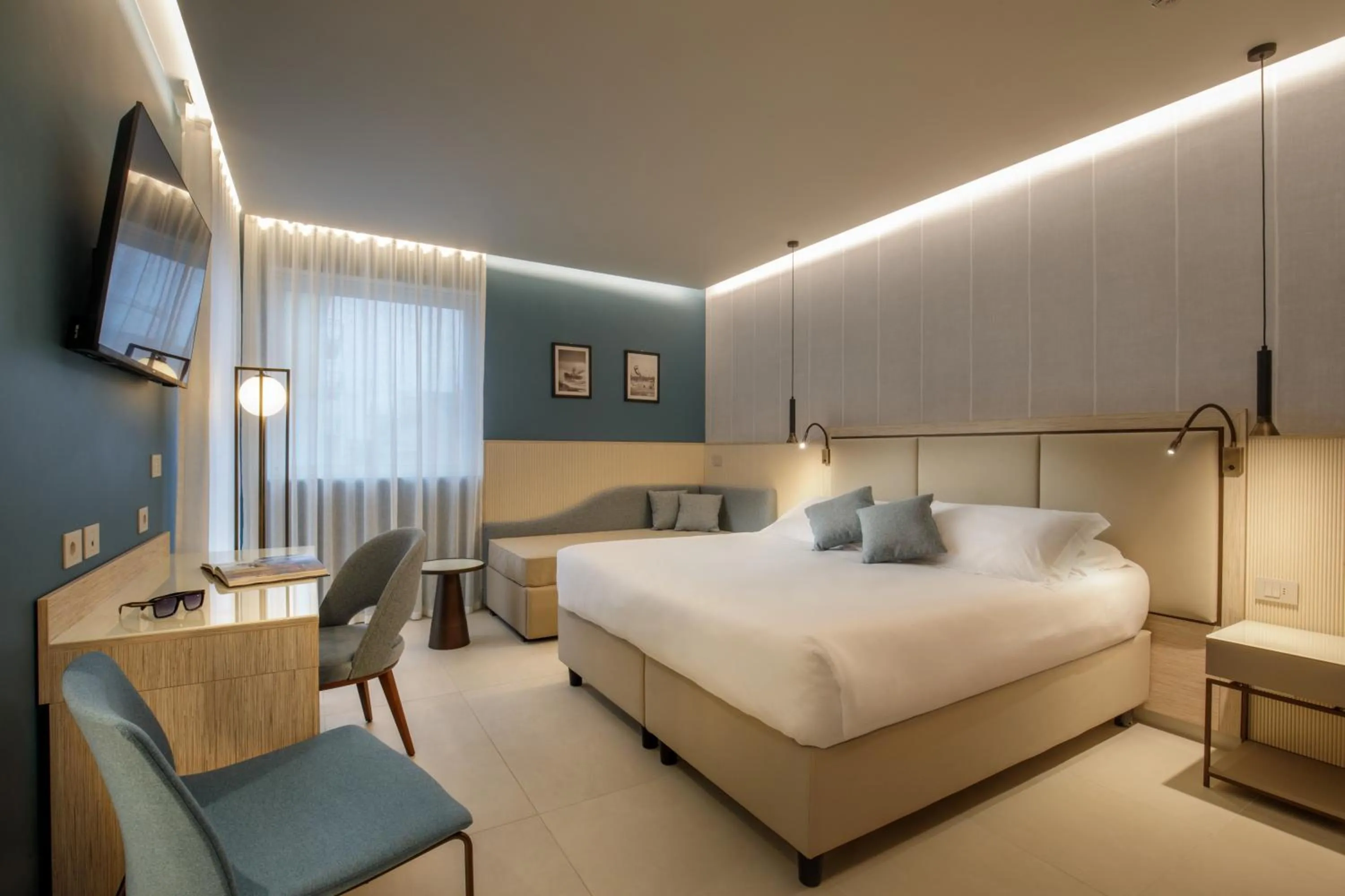 Bed in Ambasciatori Suite Hotel