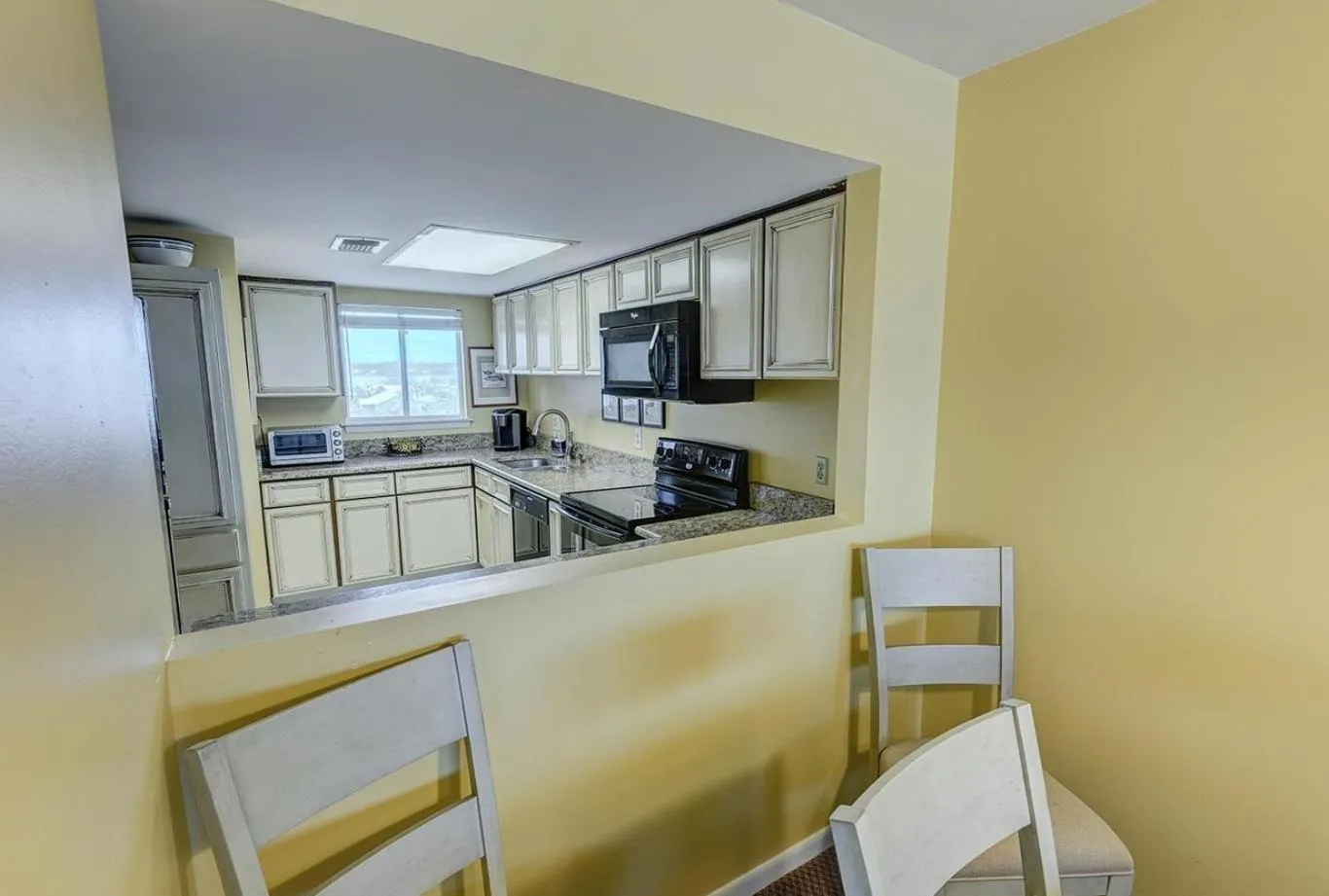 Kitchen or kitchenette in Edgewater West 53 by ALBVR - This Beachfront Condo is Perfect for your next Family Getaway