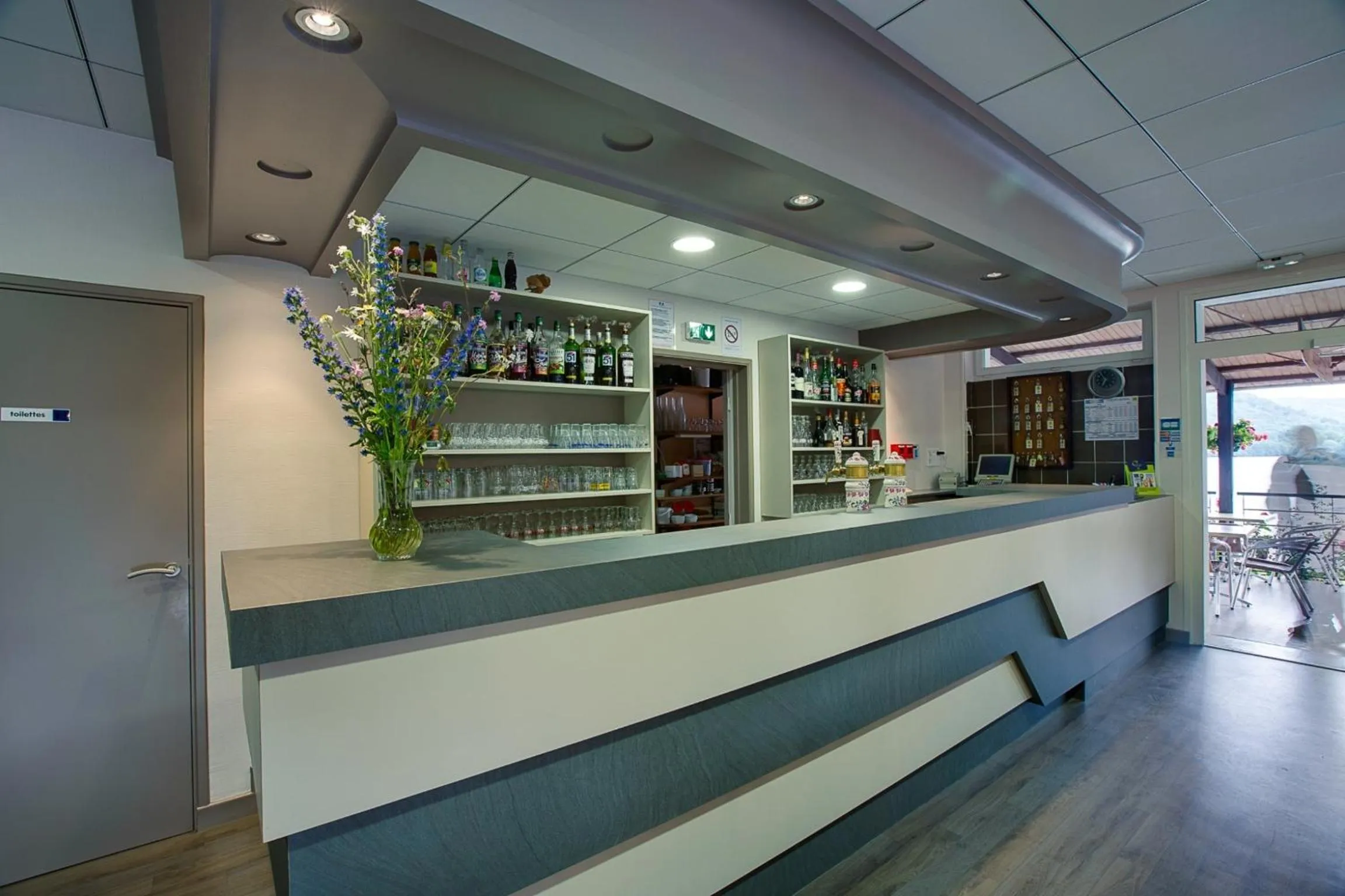 Lounge or bar in Logis Hôtel Belle Vue