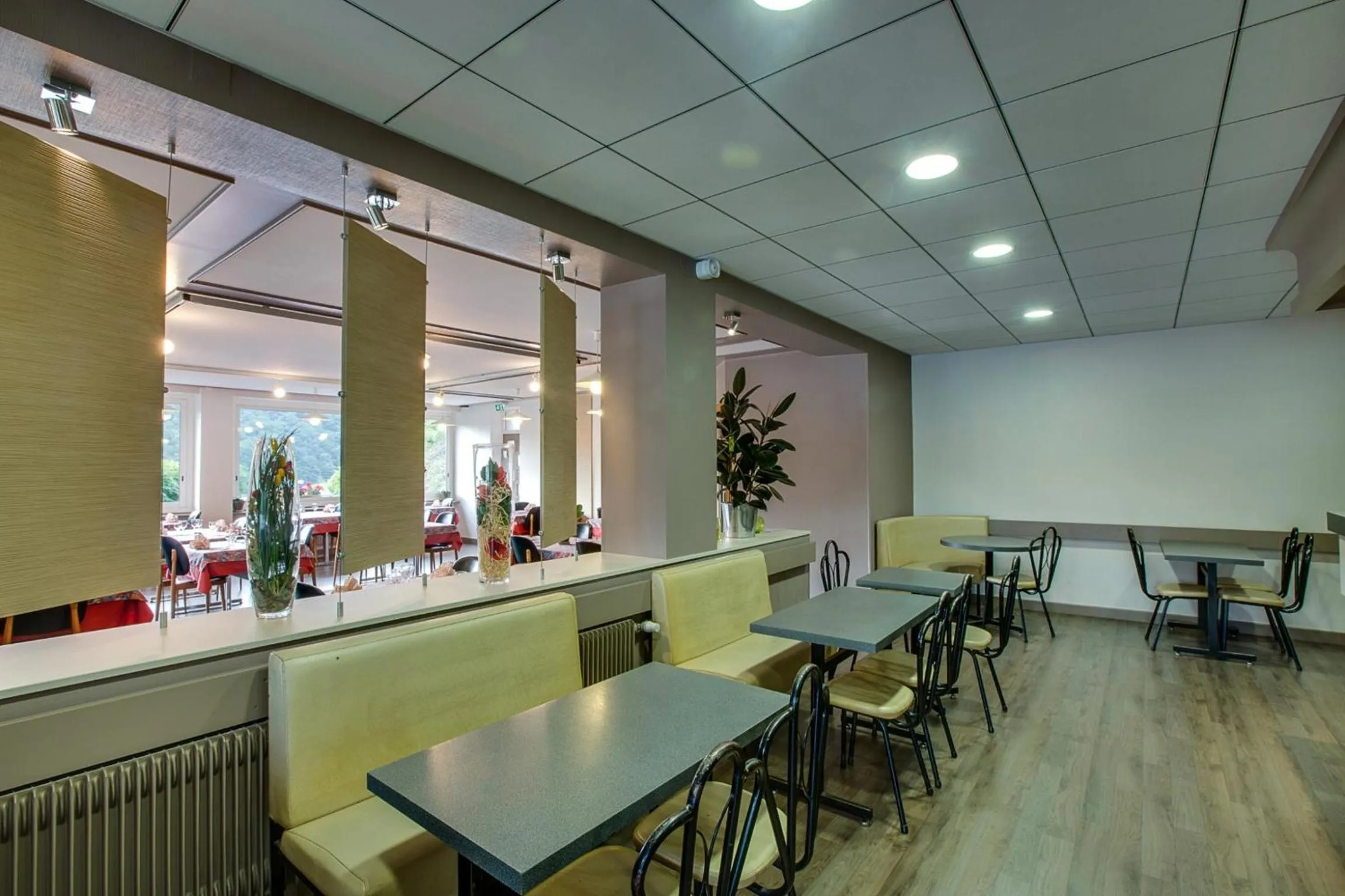 Lounge or bar in Logis Hôtel Belle Vue