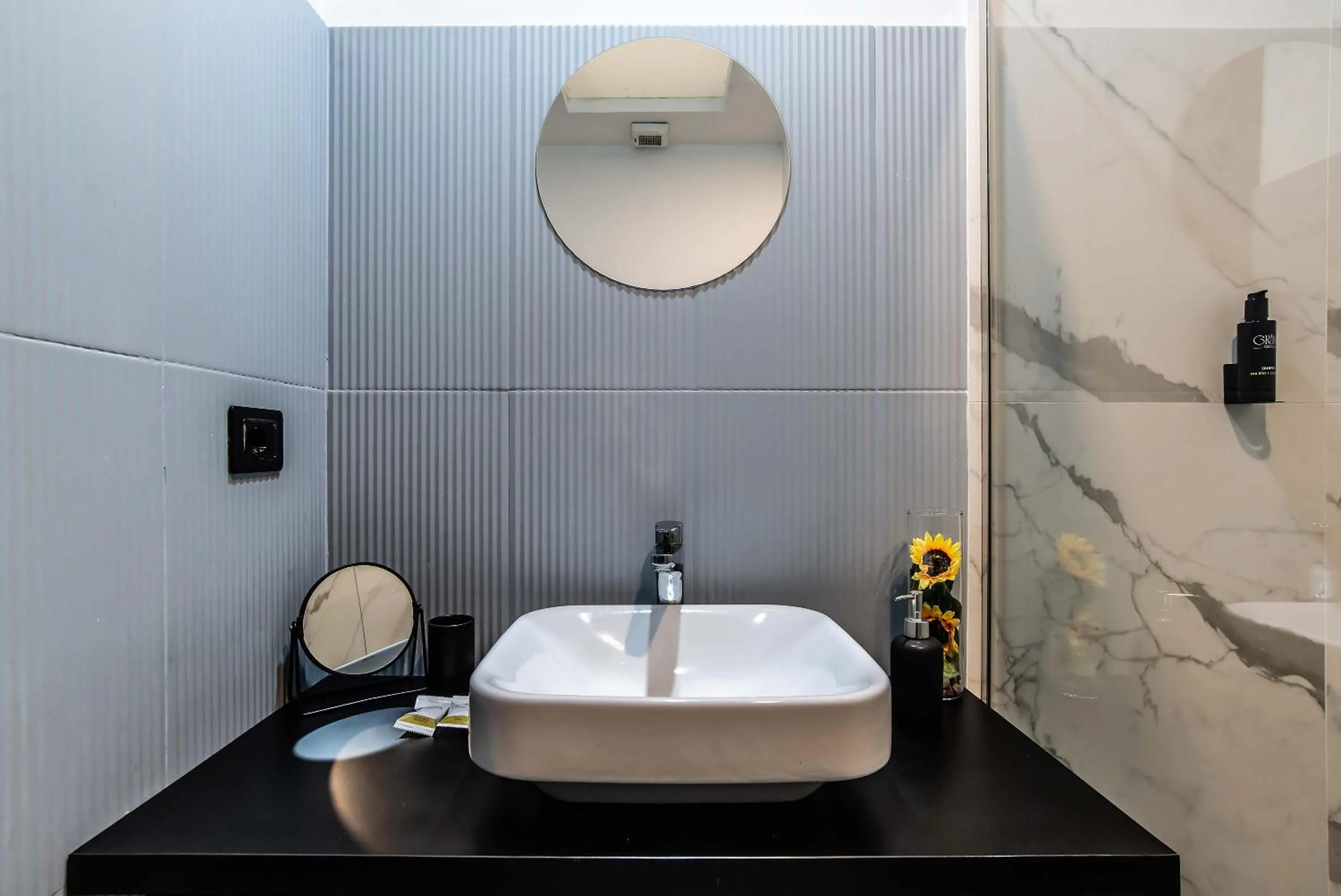 Toilet in Gram Suites