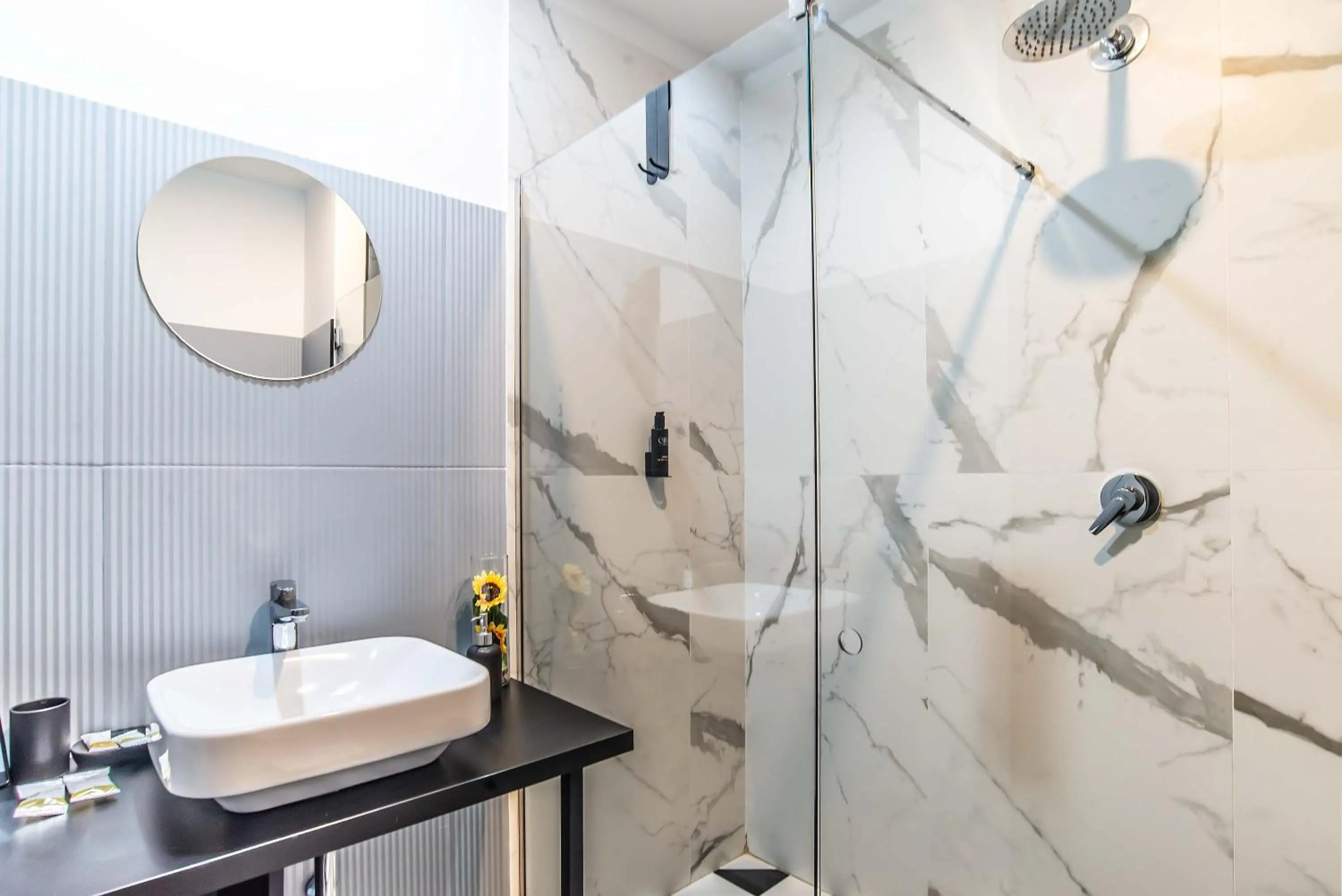 Shower in Gram Suites