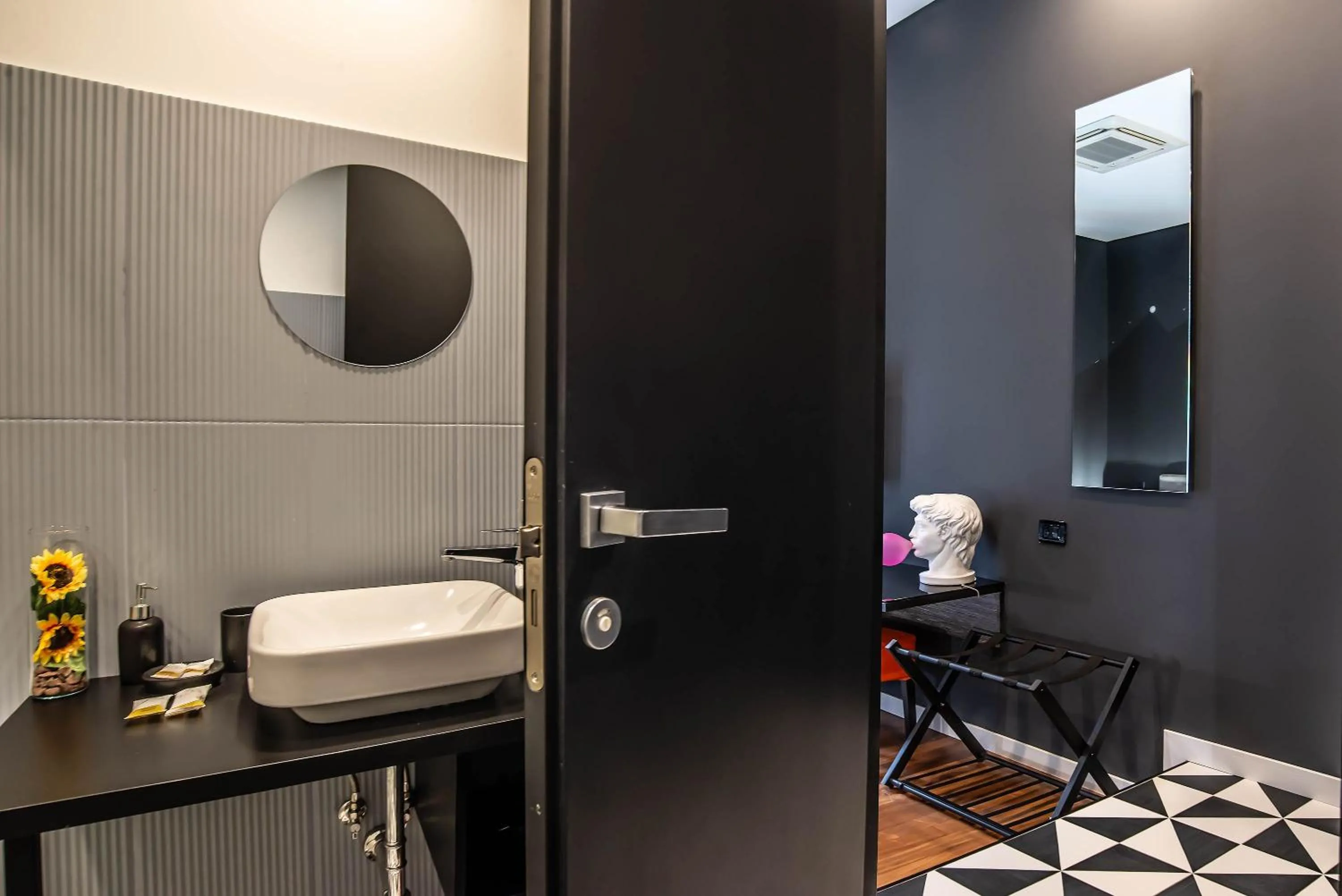 Toilet in Gram Suites