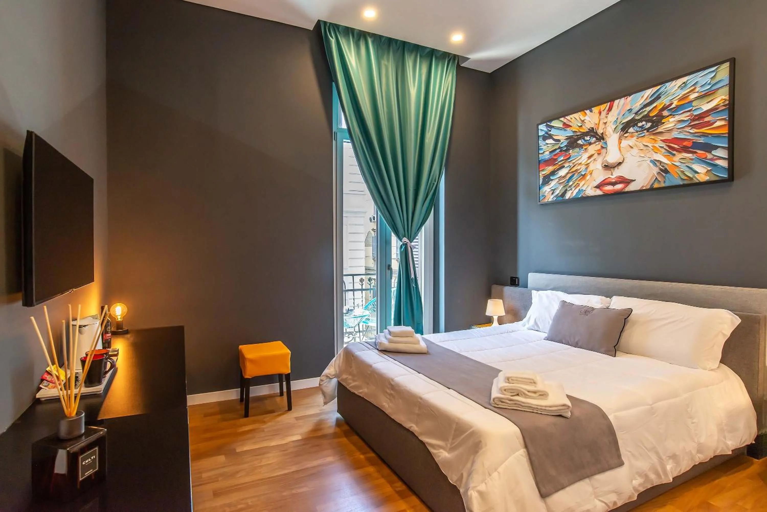 Photo of the whole room, Bed in Gram Suites