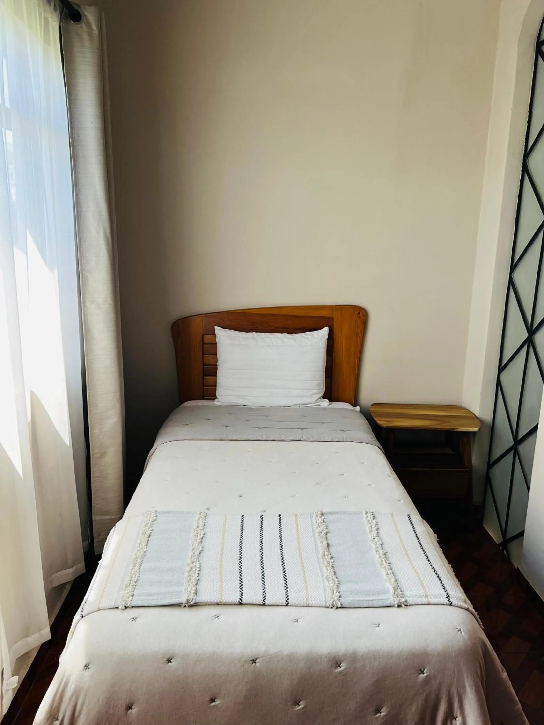 Bed in Hostería Casa Marquez
