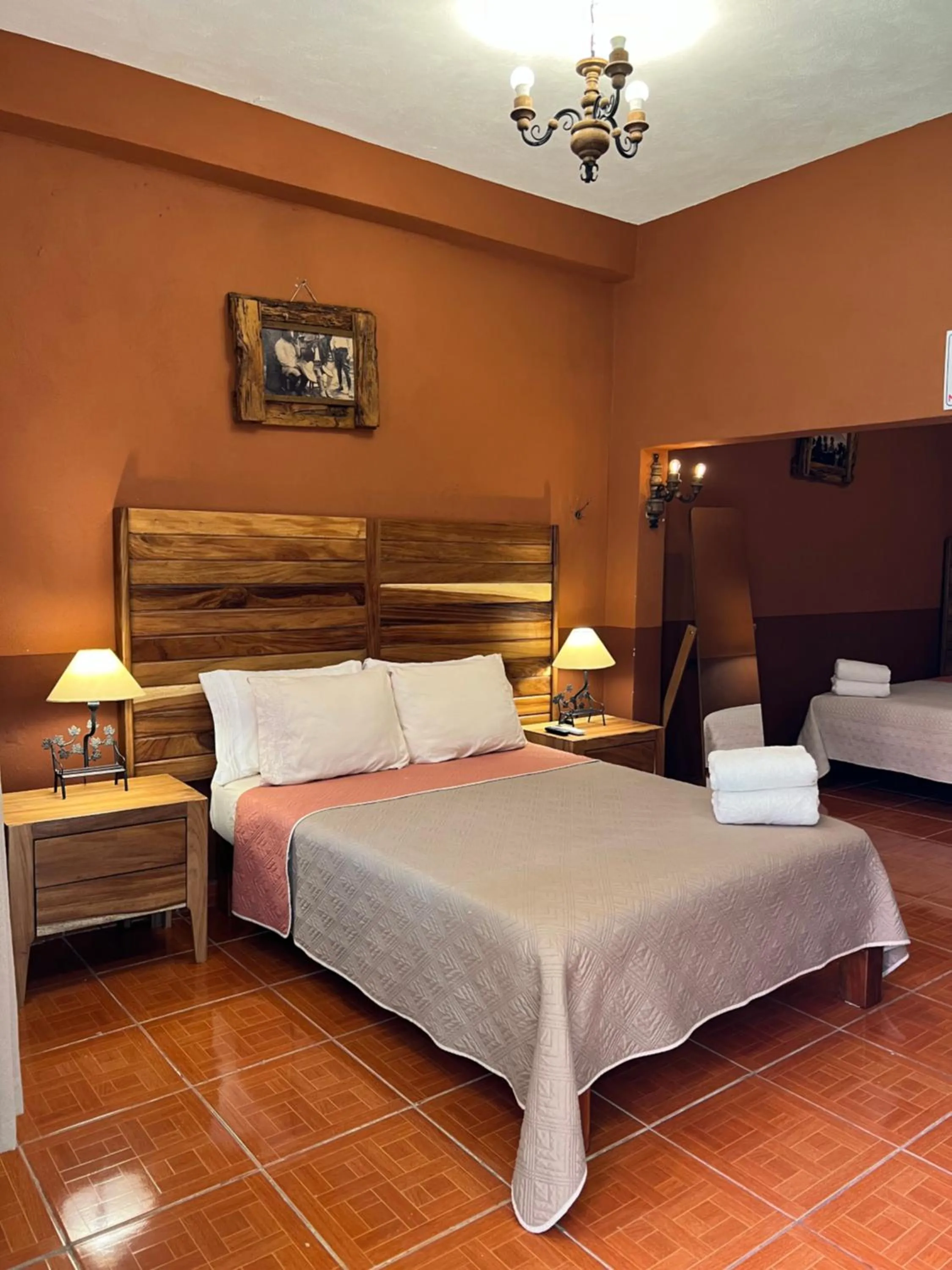Bed in Hostería Casa Marquez