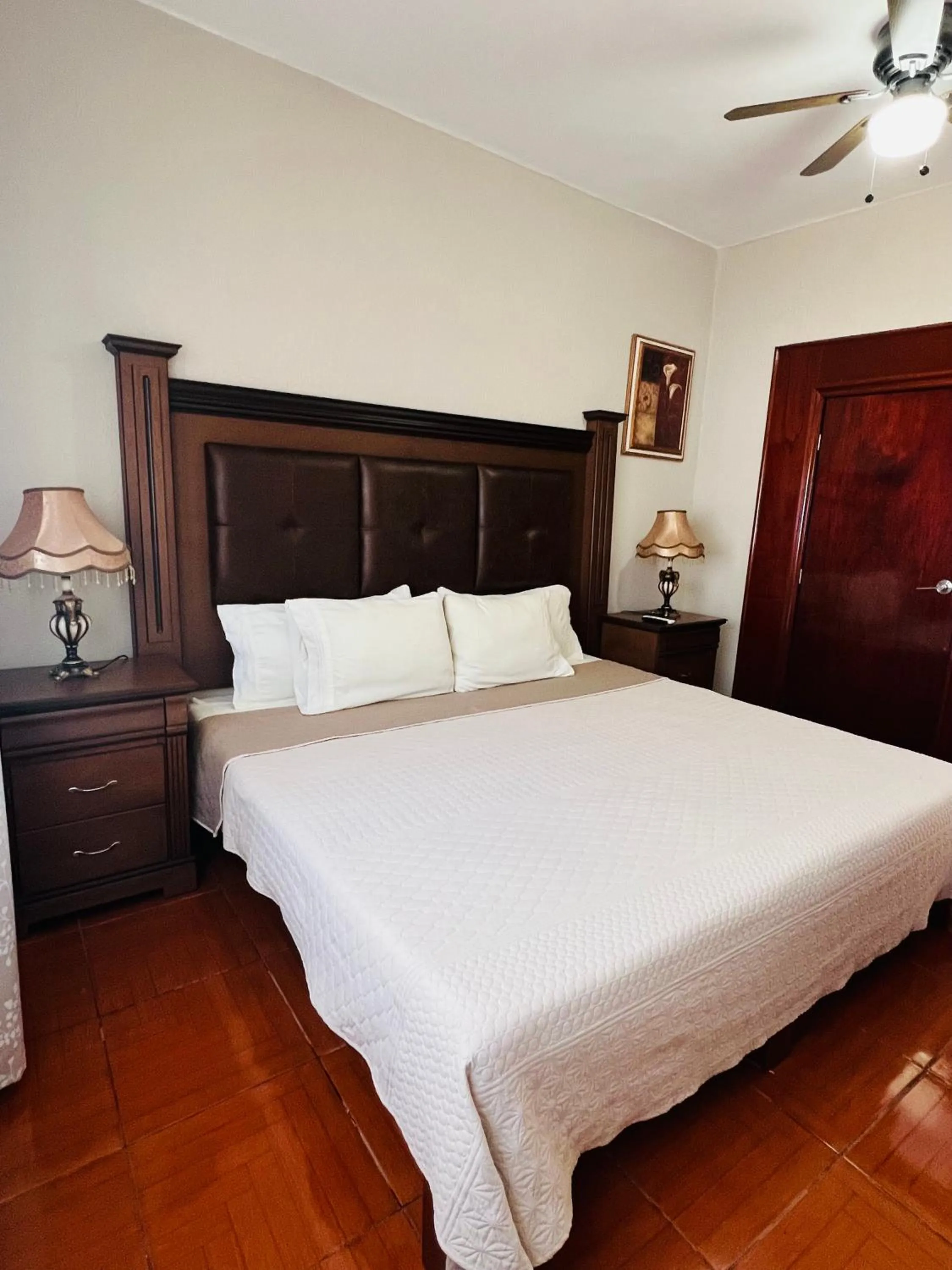 Bed in Hostería Casa Marquez