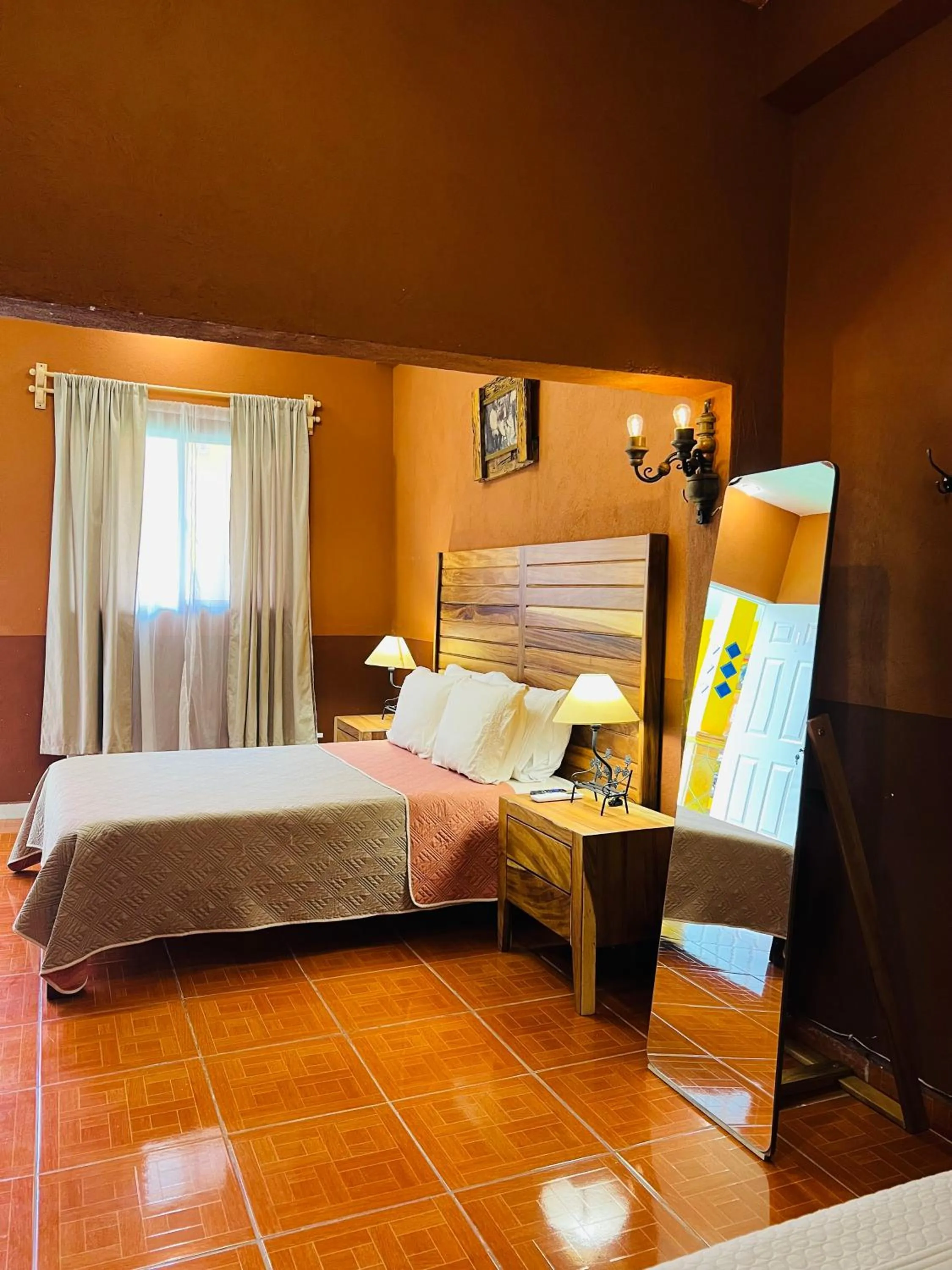 Bed in Hostería Casa Marquez