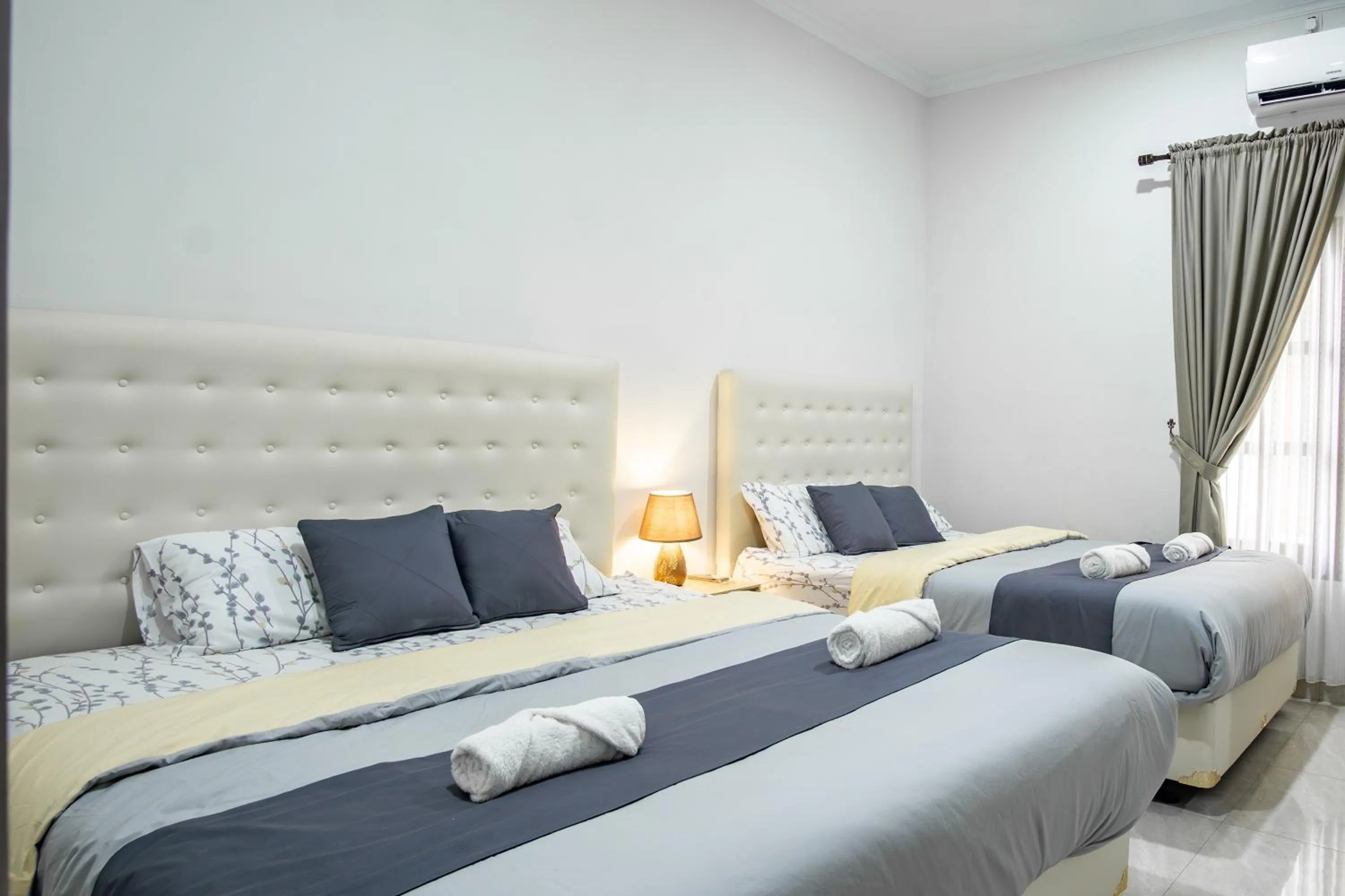 Bed in Bisma Balcony Homestay