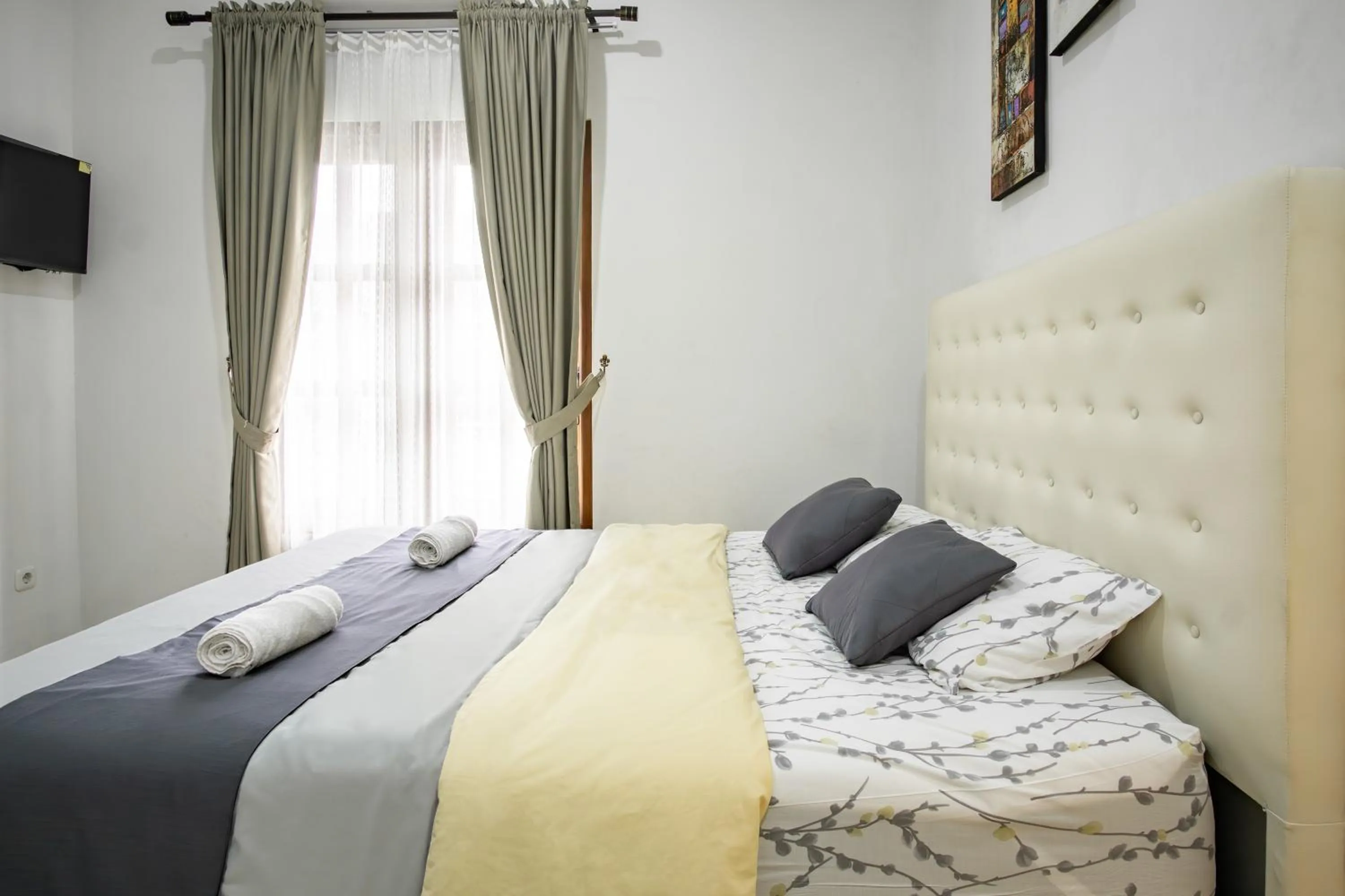 Bed in Bisma Balcony Homestay