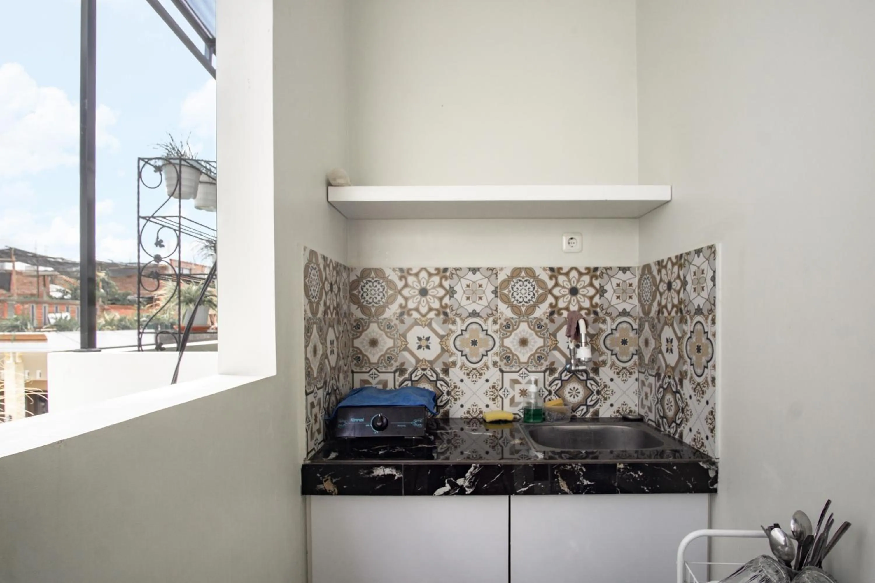 Kitchen or kitchenette in Bisma Balcony Homestay