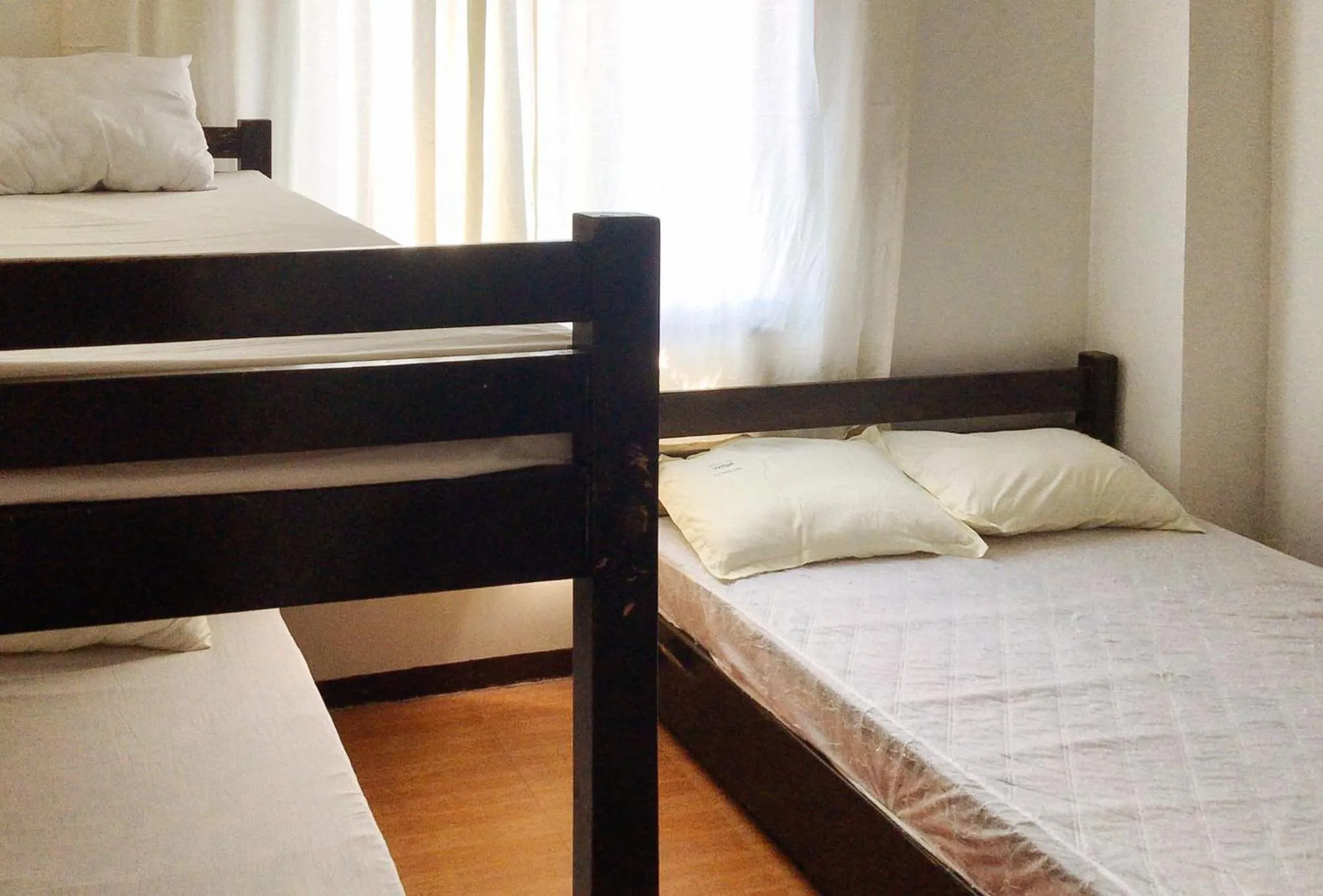 Bed in RedDoorz @ Nena's Hotel Dagupan City