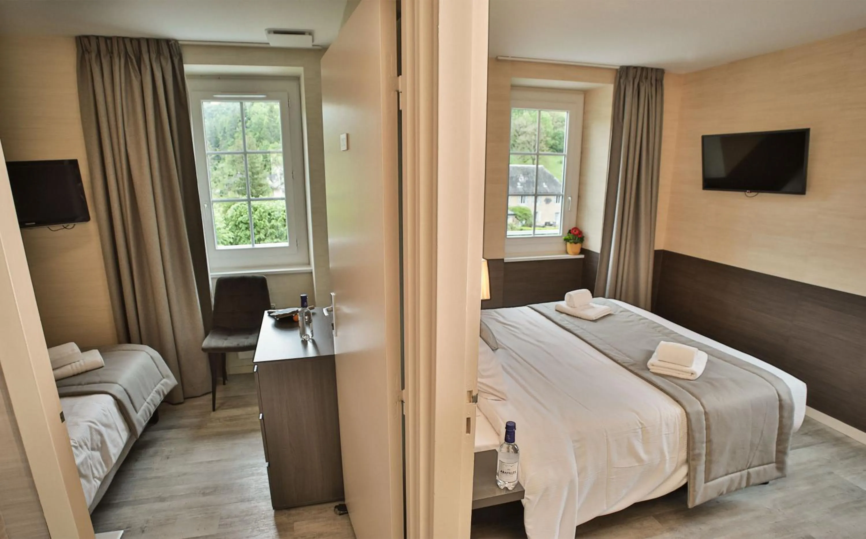 Photo of the whole room, Bed in LOGIS HOTEL L'HÔTEL DES BAINS - Salles-la-Source