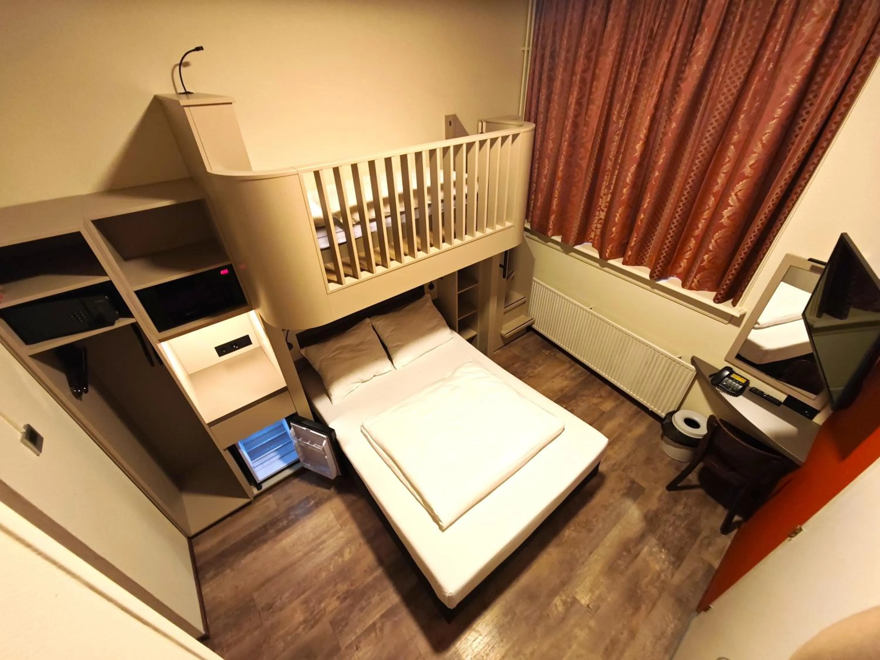 Photo of the whole room, Bed in A-Train Hotel