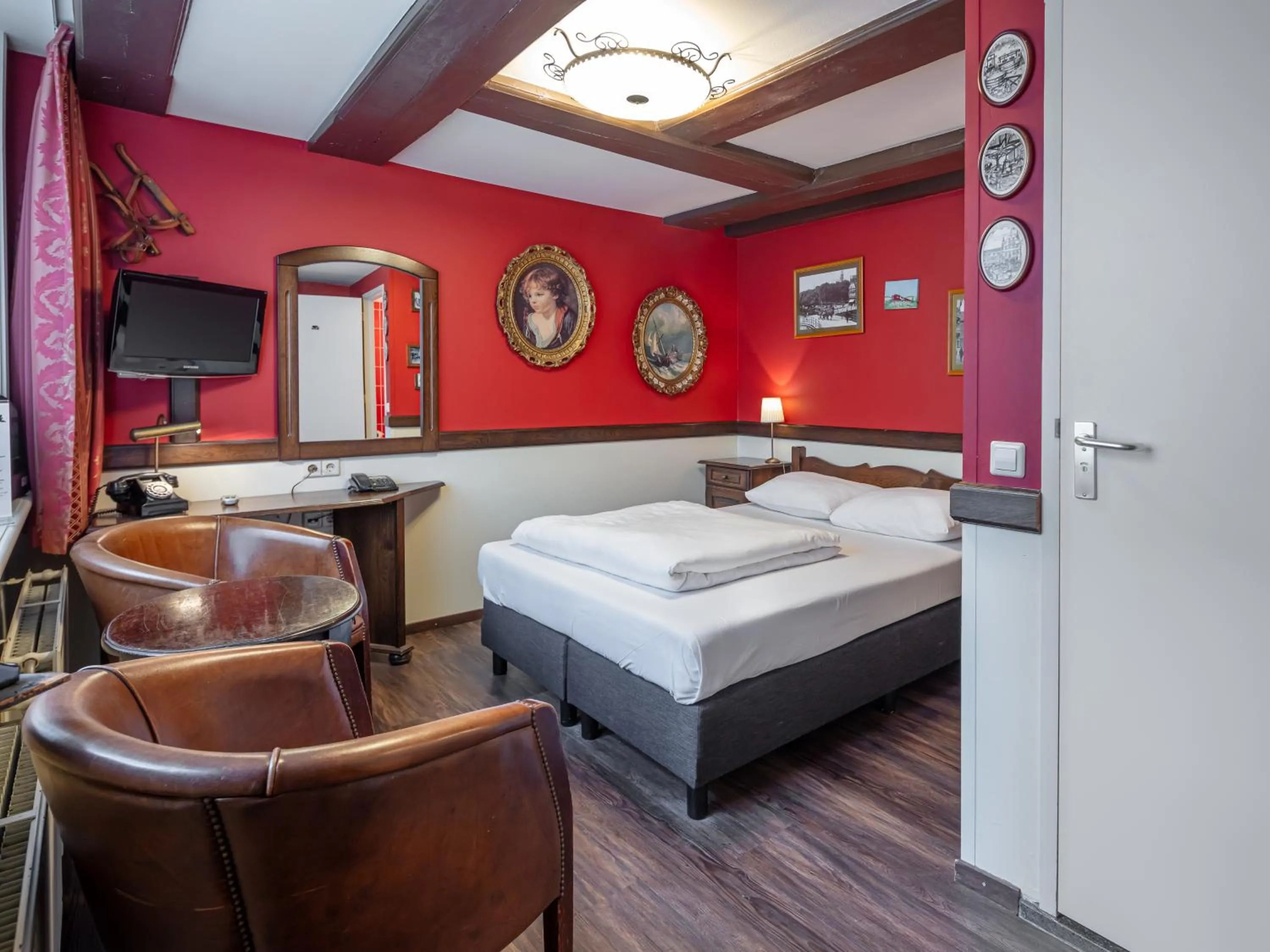 Bed in A-Train Hotel