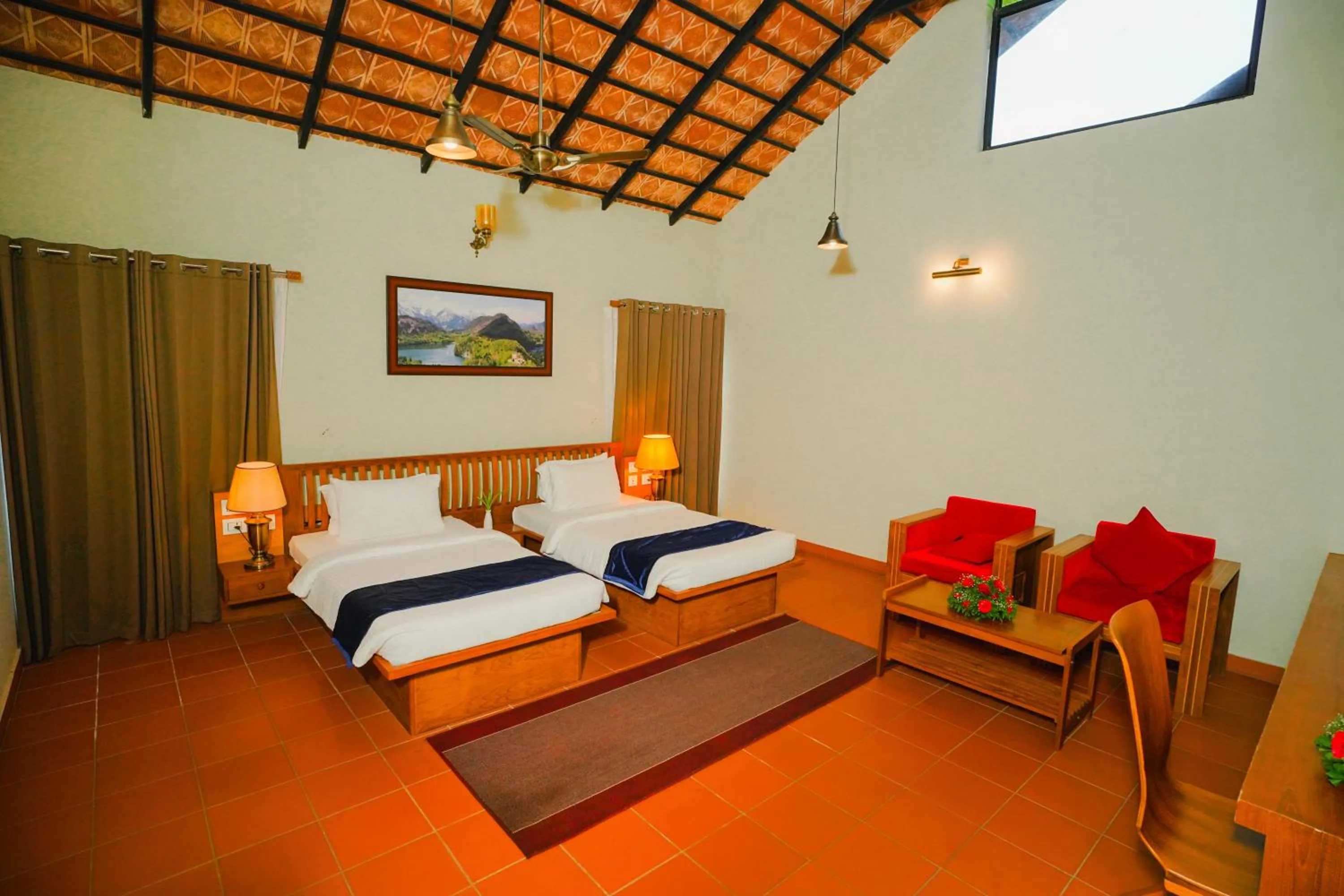Bed in Vaidekam Resorts & Wellness, Kannur