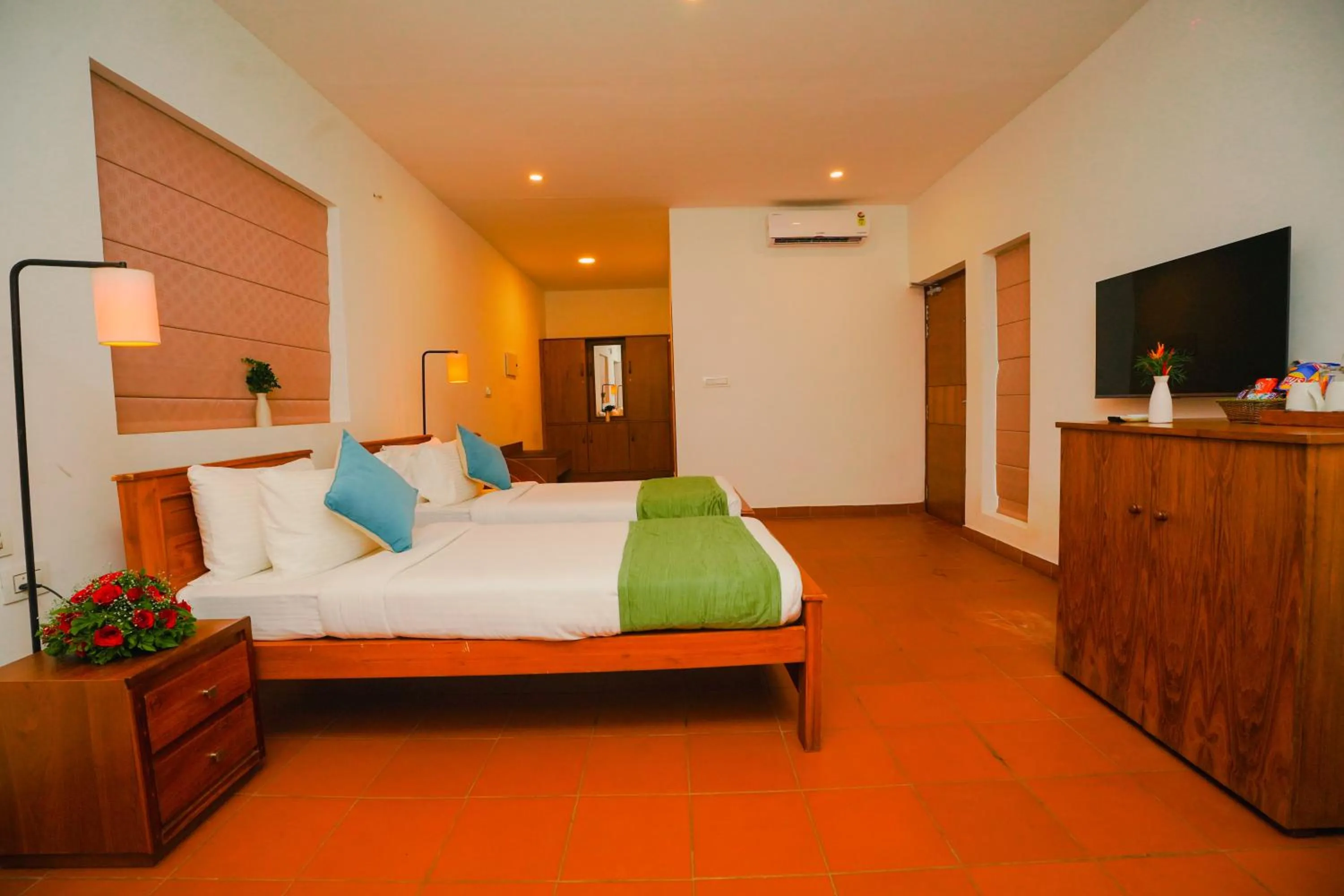 Bed in Vaidekam Resorts & Wellness, Kannur