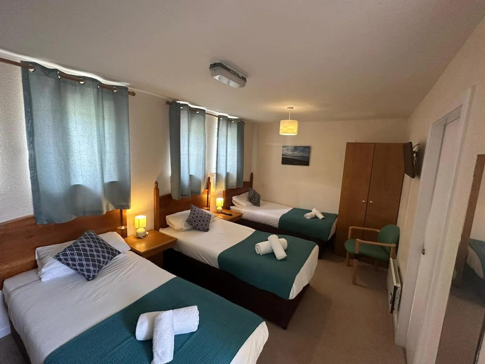 Bedroom in Mackay's Spa Lodge Hotel