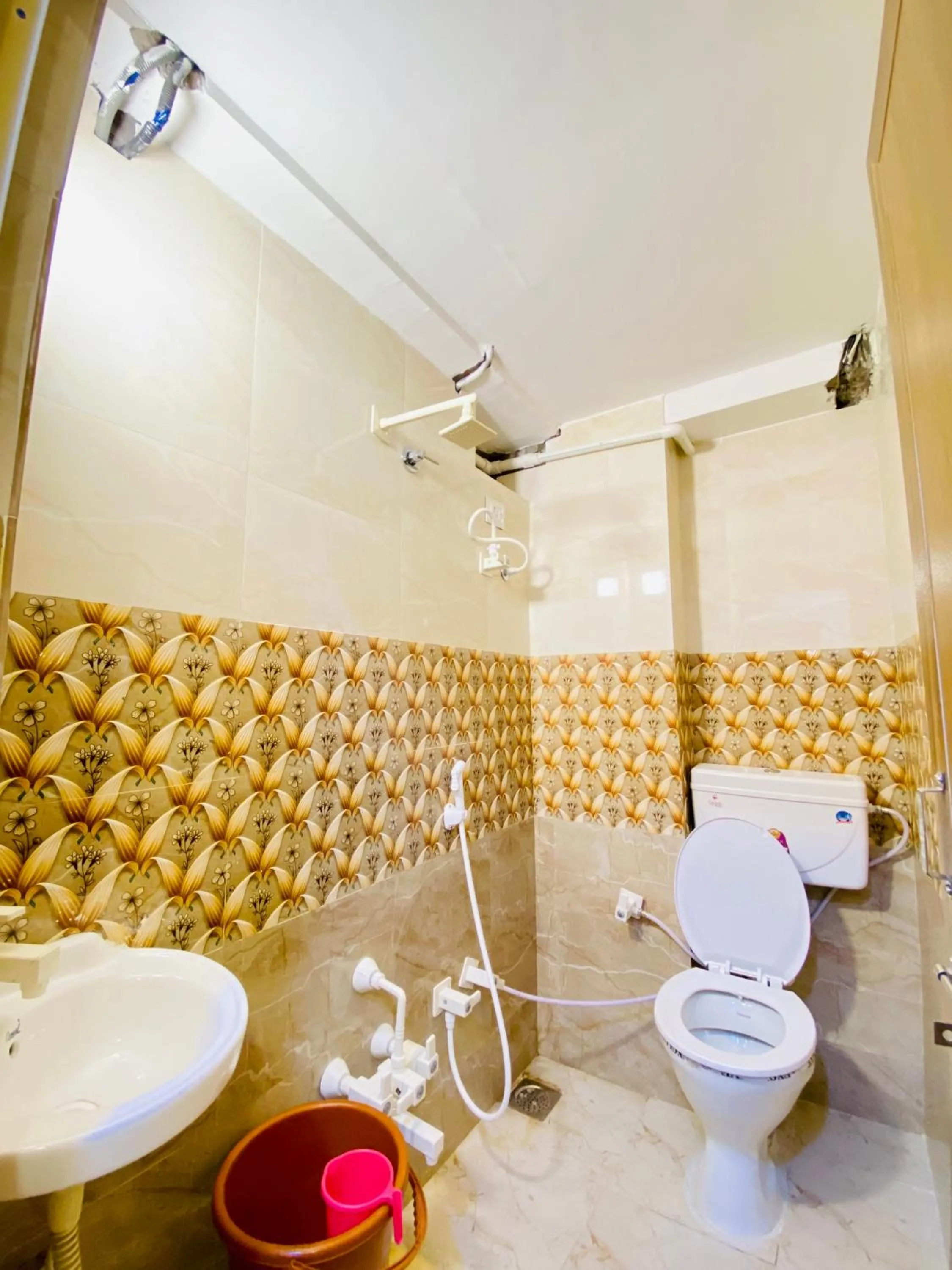 Toilet in Hotel Alexa - Satellite Prahladnagar, Ahmedabad