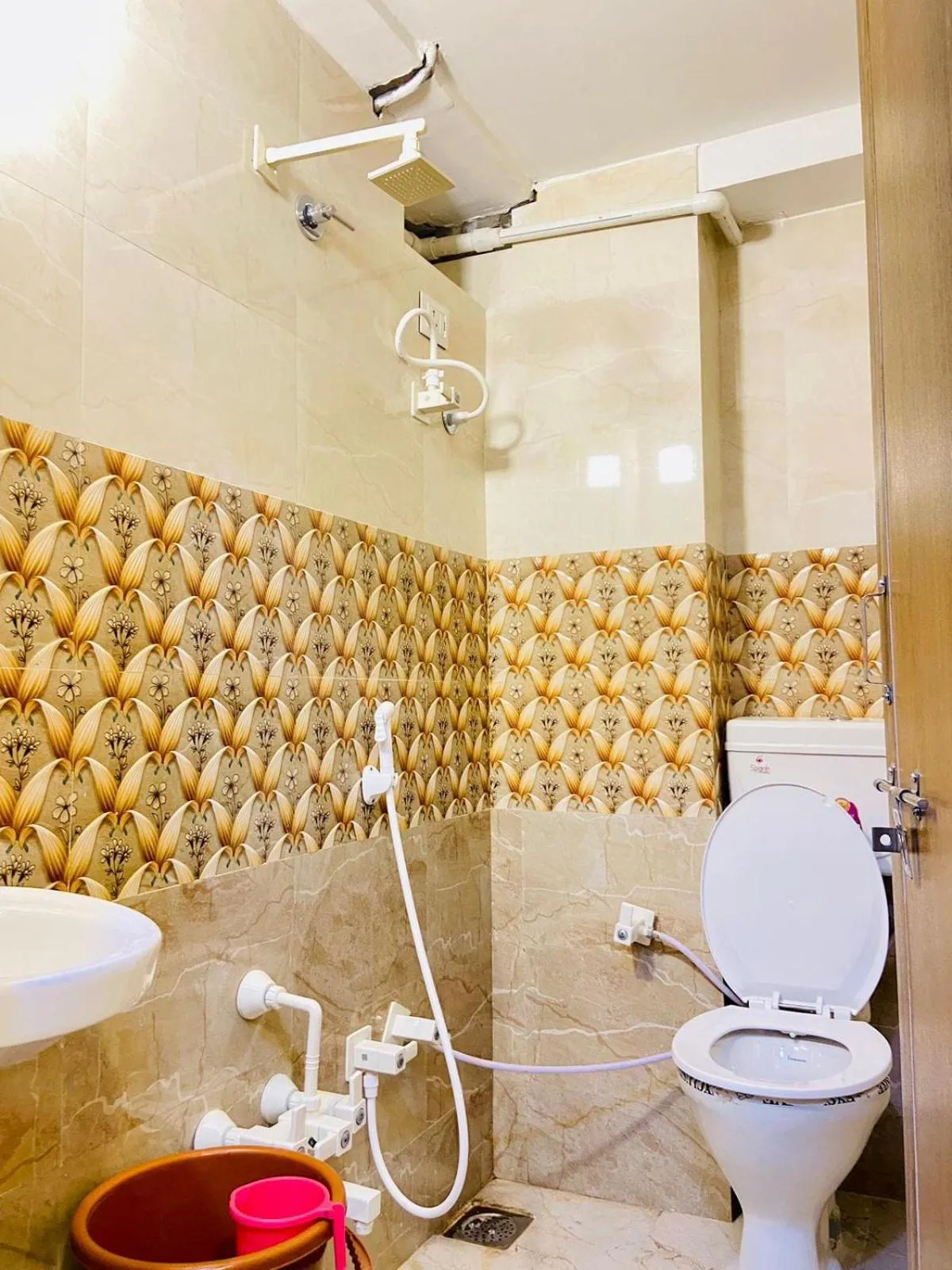 Toilet in Hotel Alexa - Satellite Prahladnagar, Ahmedabad