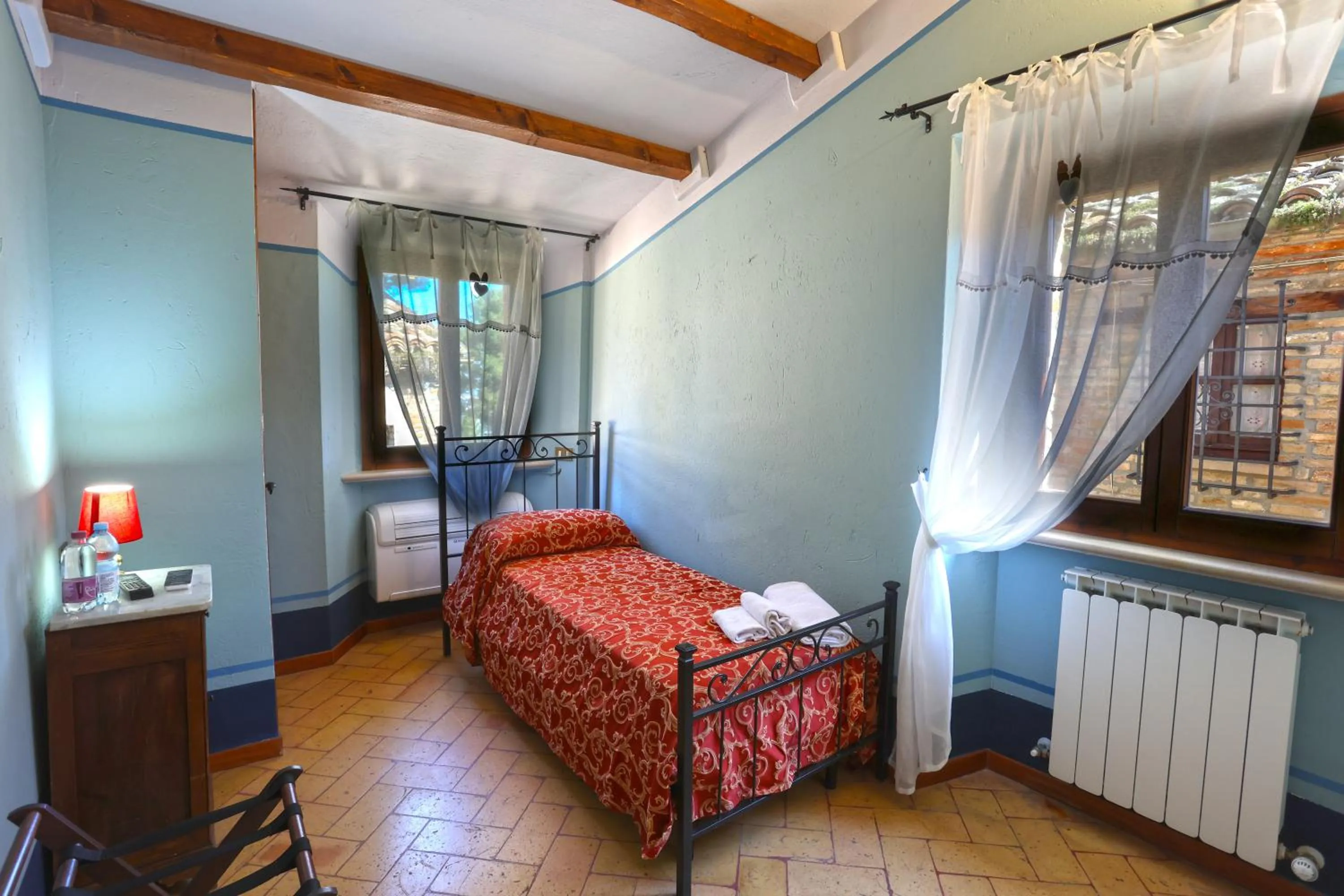 Photo of the whole room, Bed in Albergo Diffuso Borgo Montemaggiore