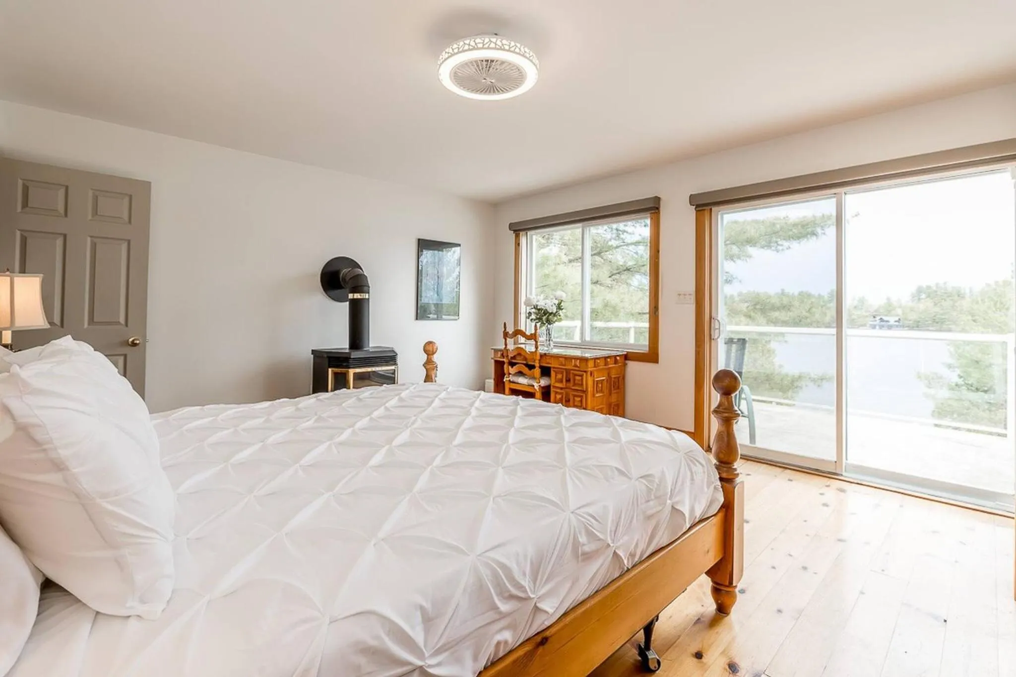 Bed in Muskoka Lakeshore Cottage Bliss