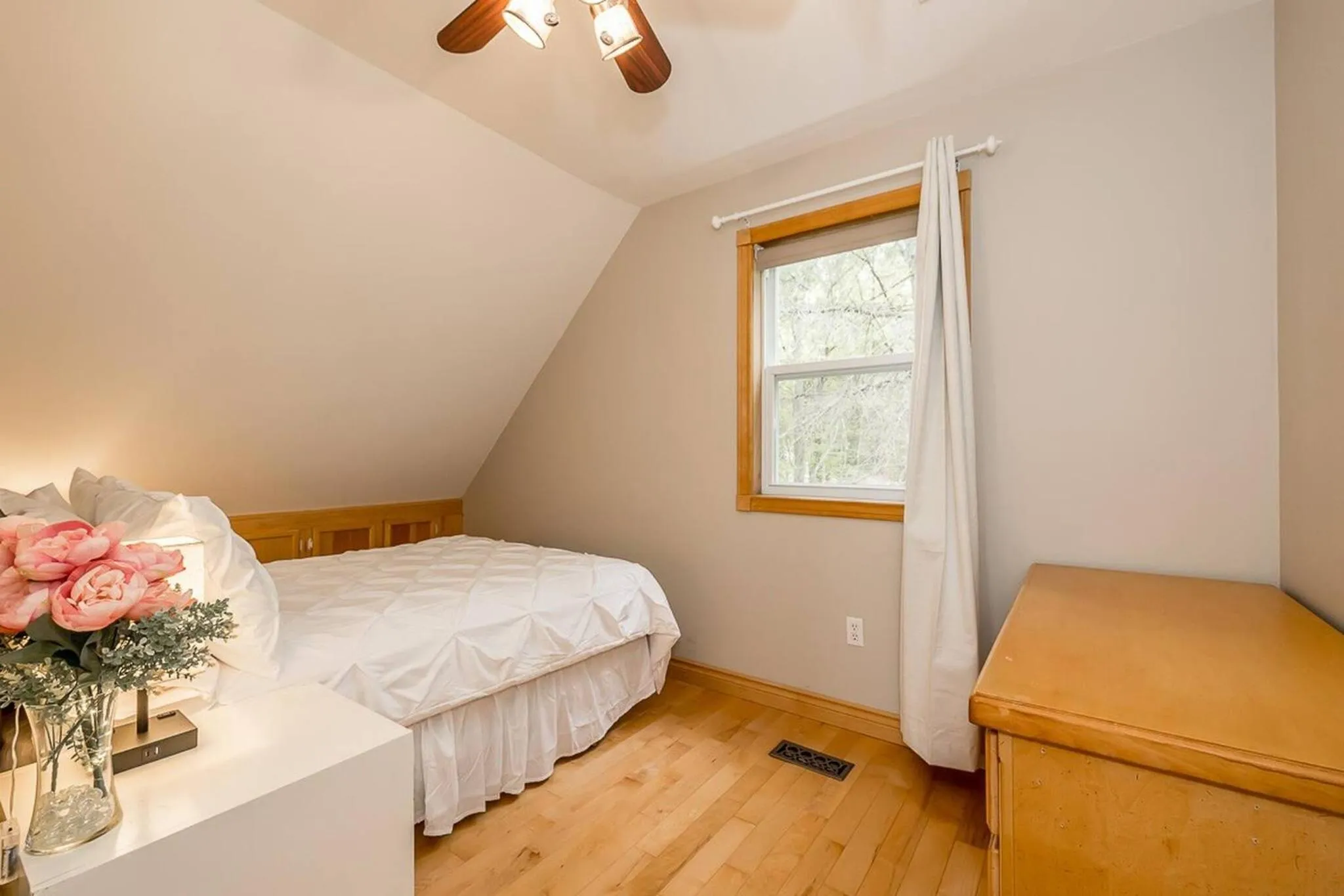 Bed in Muskoka Lakeshore Cottage Bliss