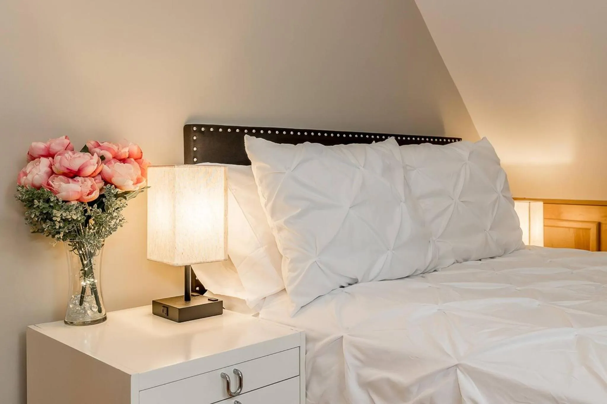 Bed in Muskoka Lakeshore Cottage Bliss