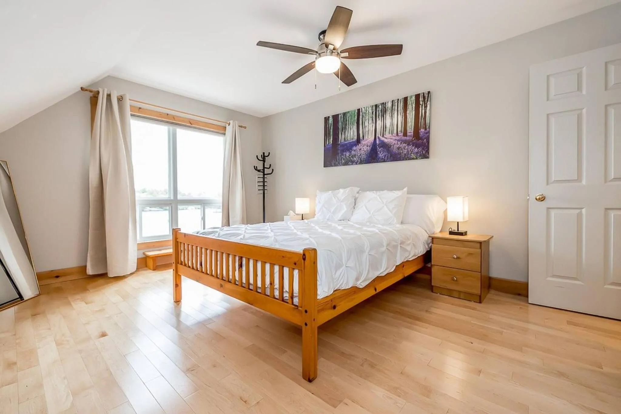 Bed in Muskoka Lakeshore Cottage Bliss