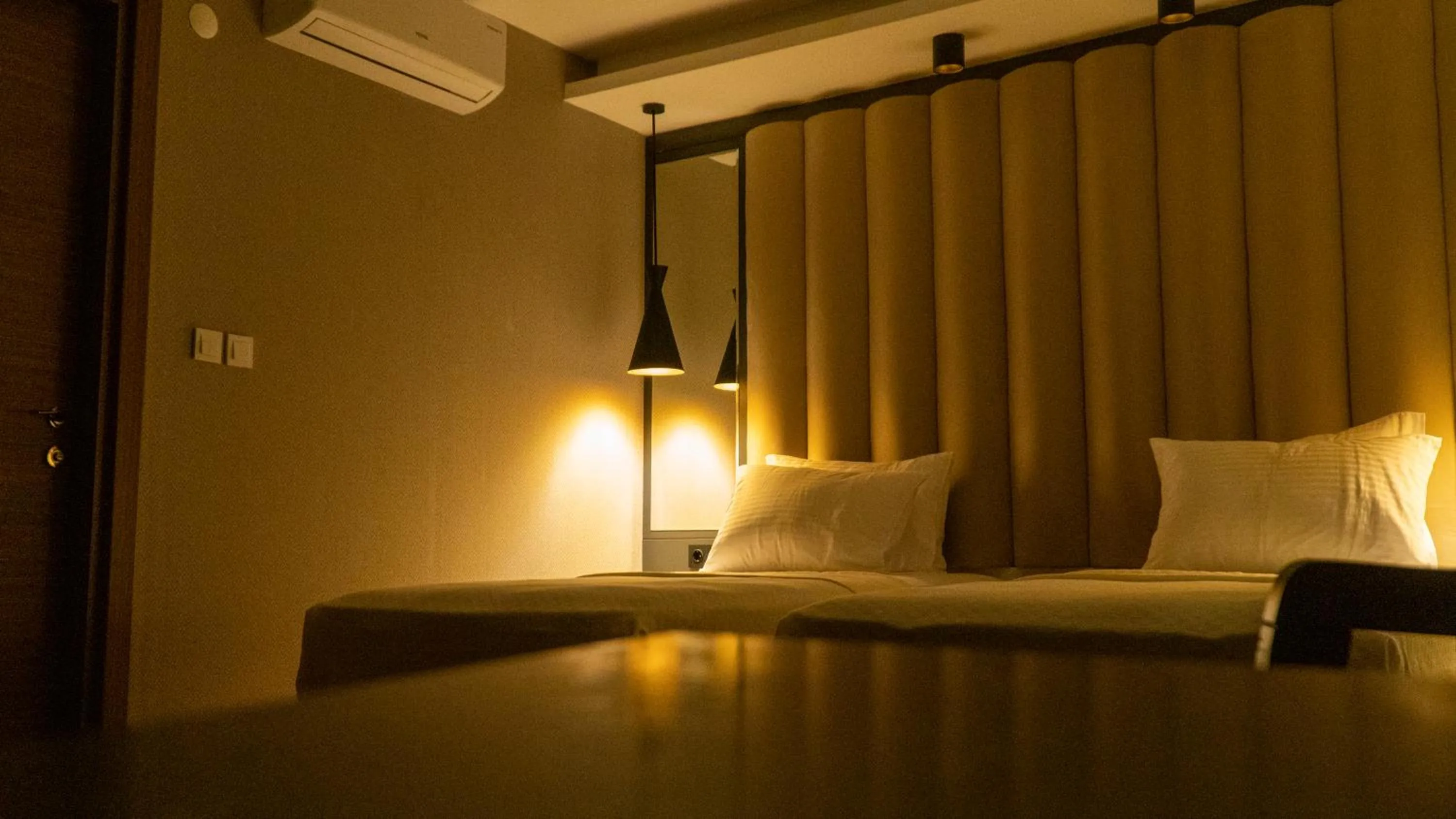 Bed in Bloom Suite Hotel