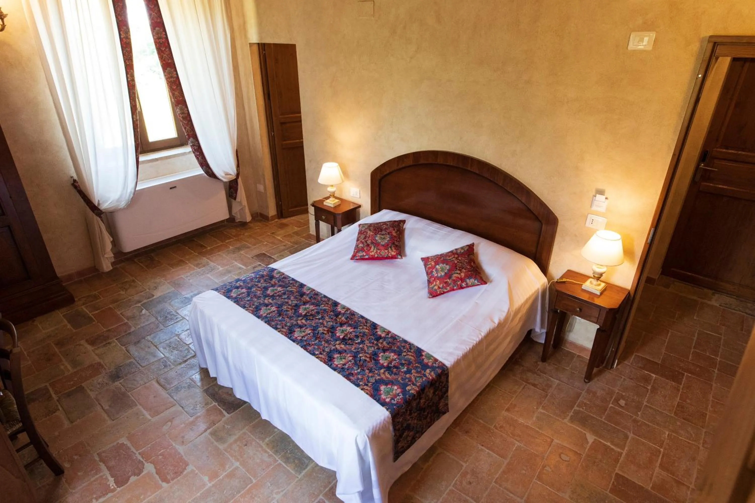 Bed in Locanda di Montegiove