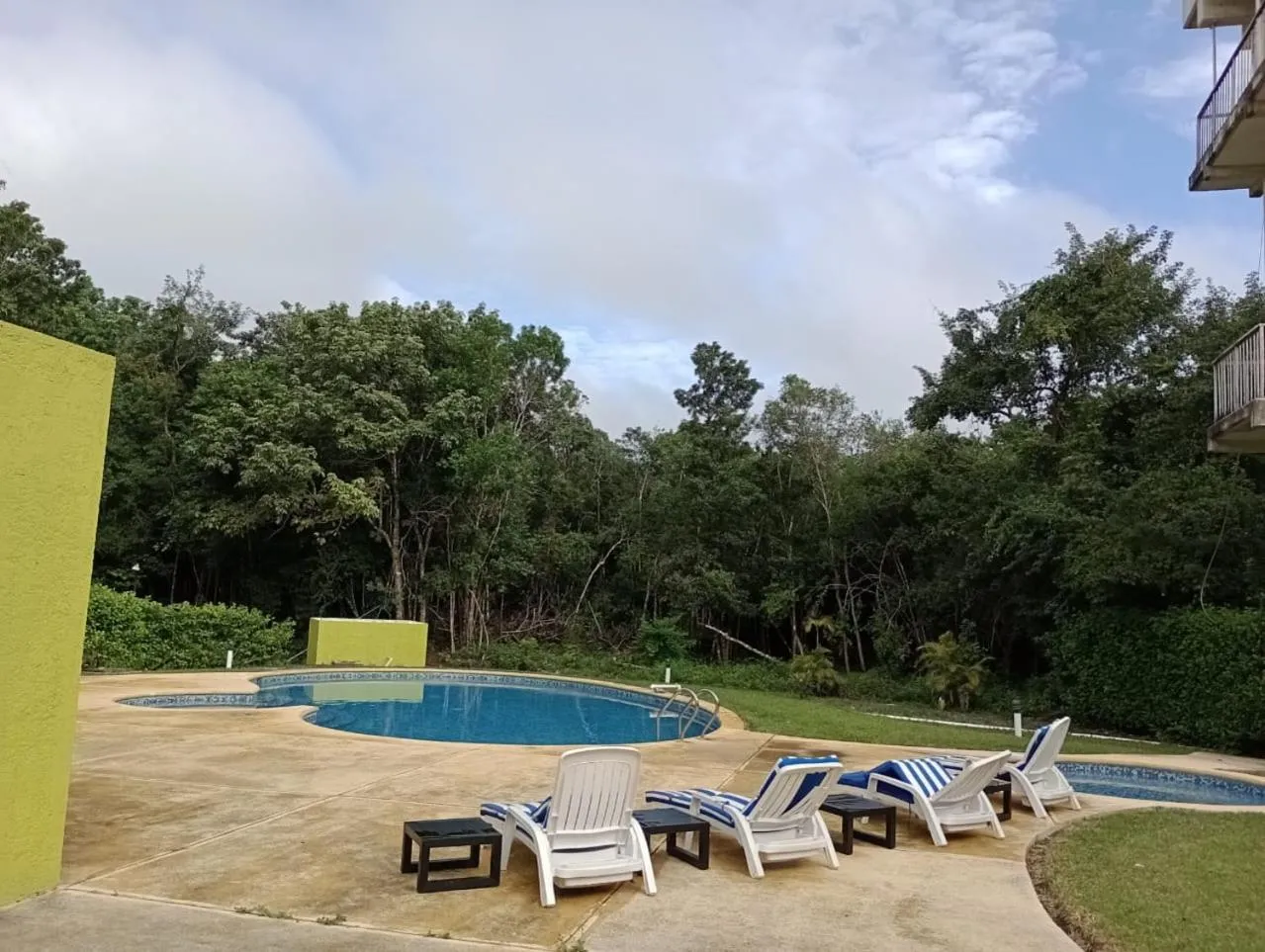 Swimming pool in hotel villas chicanna