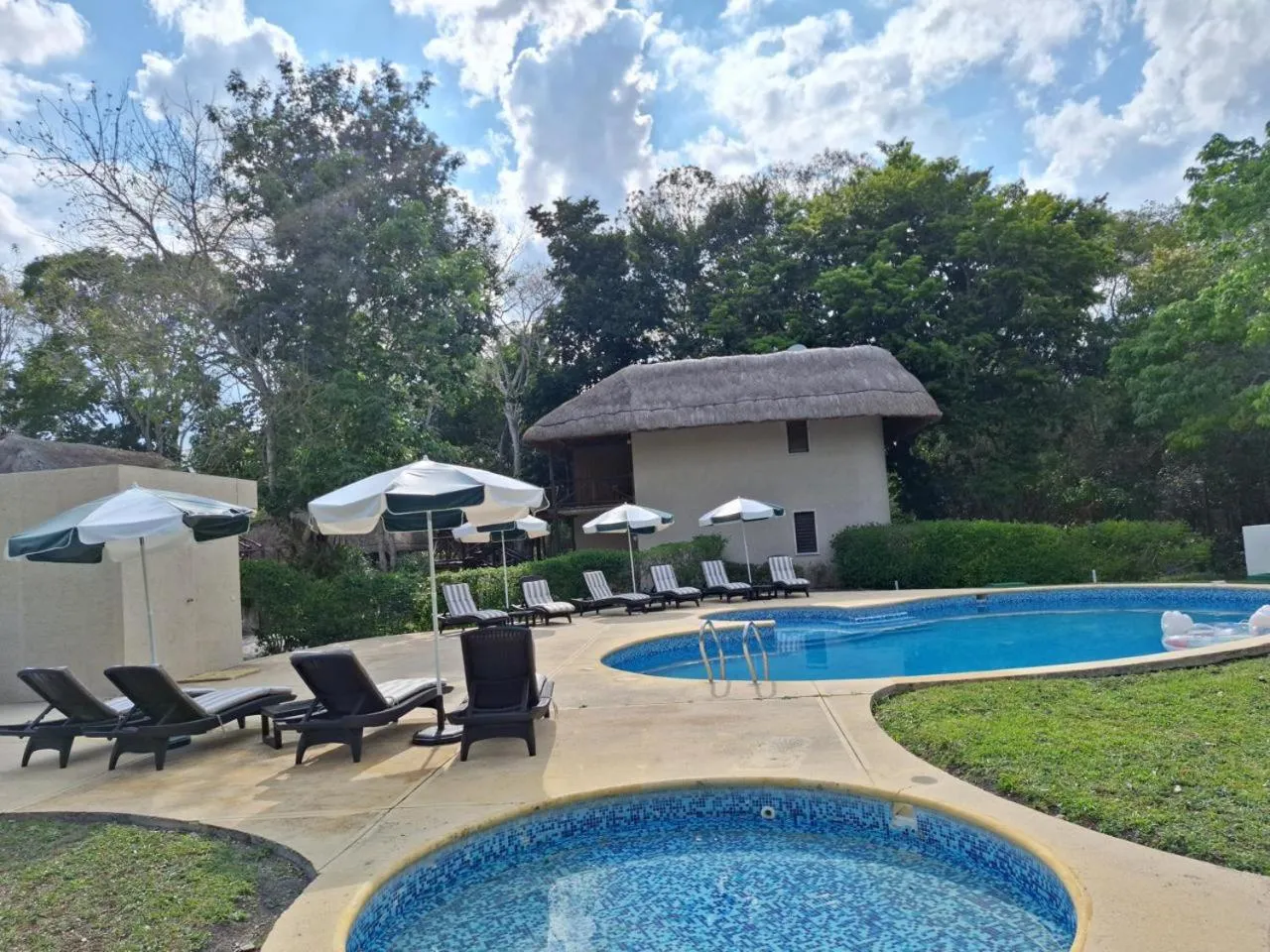 Swimming pool in hotel villas chicanna