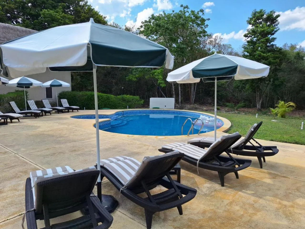 Swimming pool in hotel villas chicanna