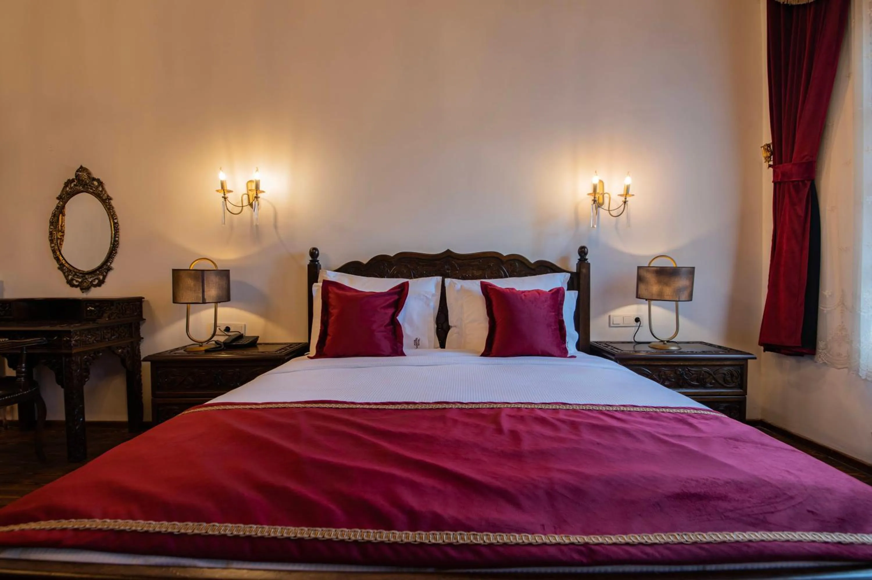 Bed in Four Mansions Hotel