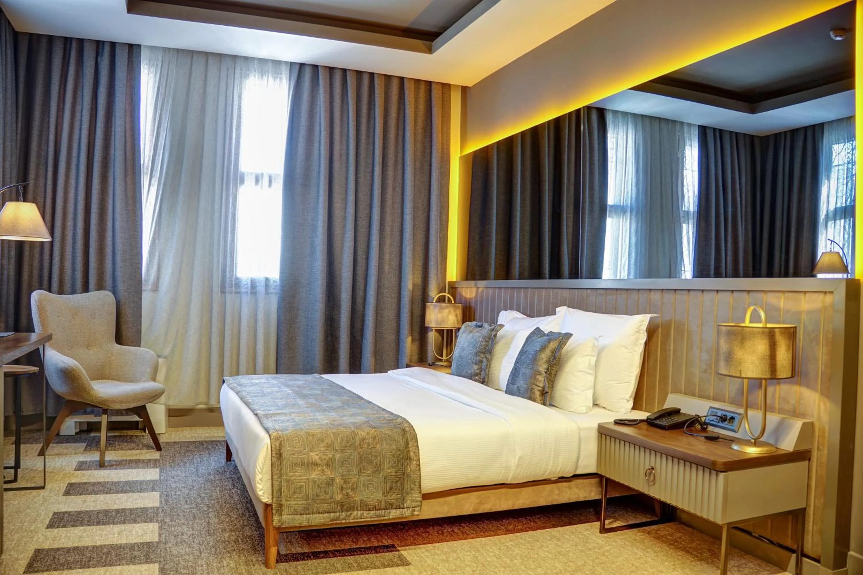 Bed in Four Mansions Hotel