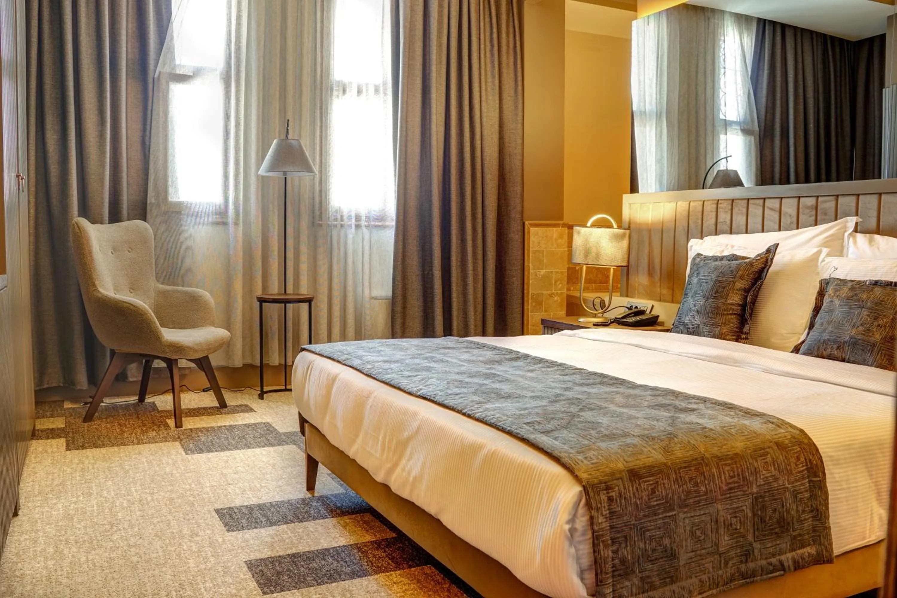 Bed in Four Mansions Hotel